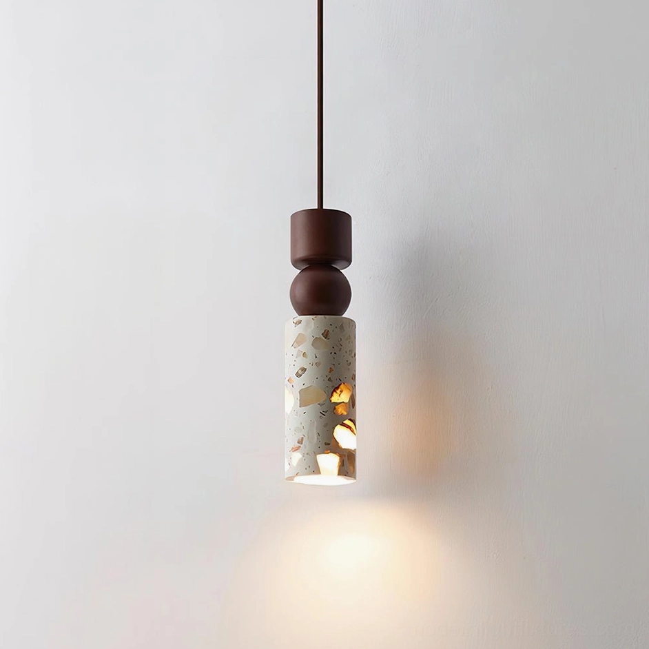Artena terrazzo pendant light in walnut color wood finish showcasing modern sculptural design
