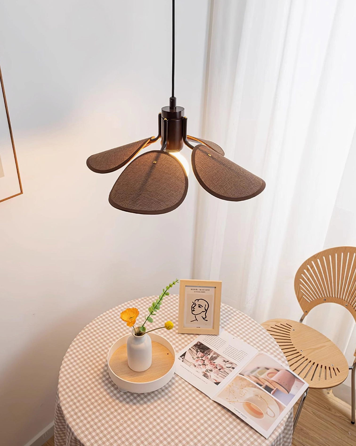 Artisan hand-woven rattan pendant light showcasing natural material variations and unique craftsmanship