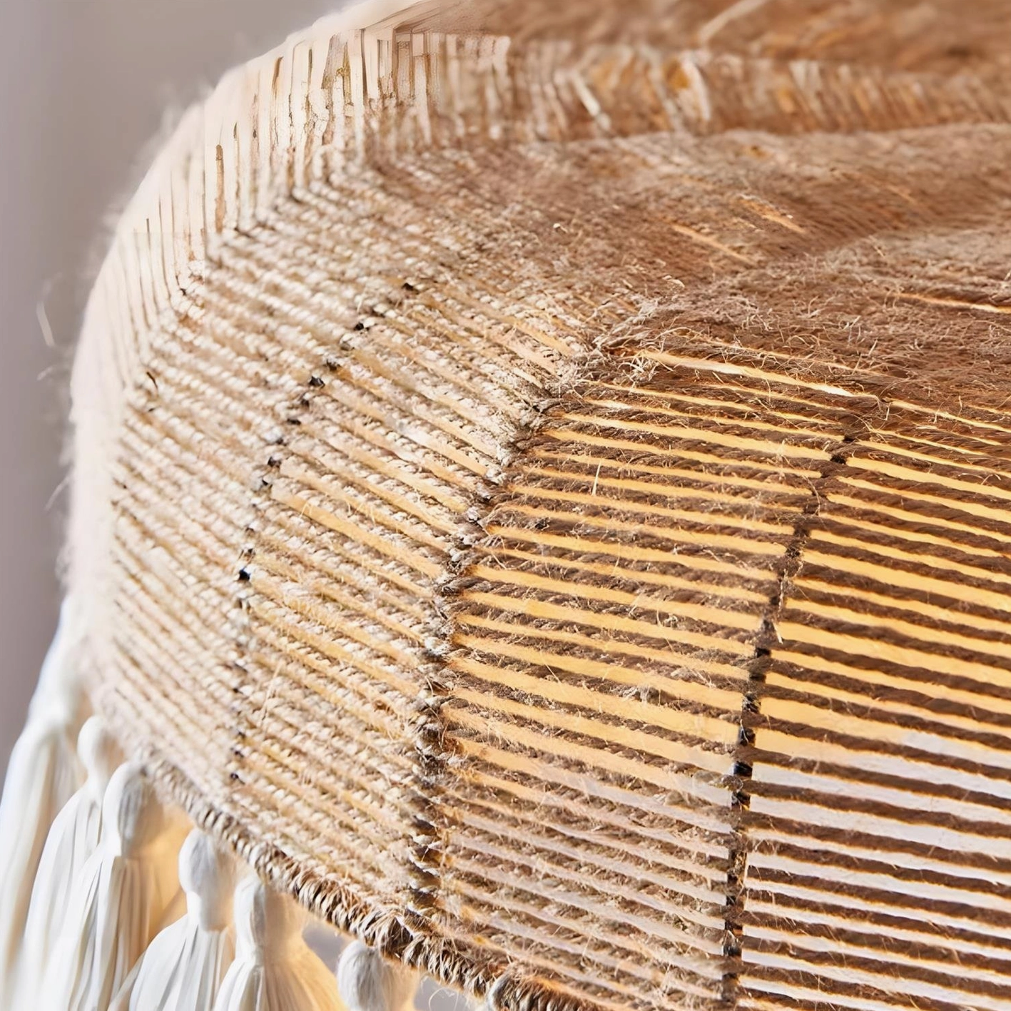 Artisan hemp rope rattan pendant light with white flowing tassel fringe, bohemian drum shade design