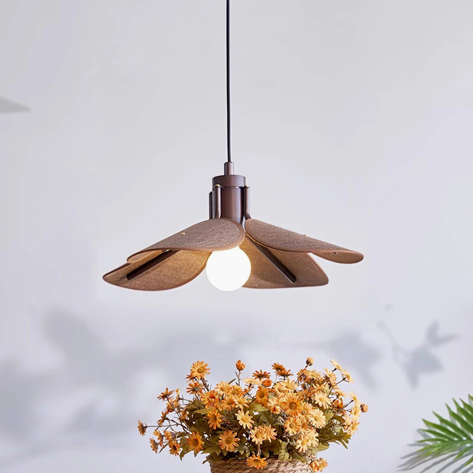 Artisan woven rattan pendant lamp in dark brown color with modern flower petal shade design