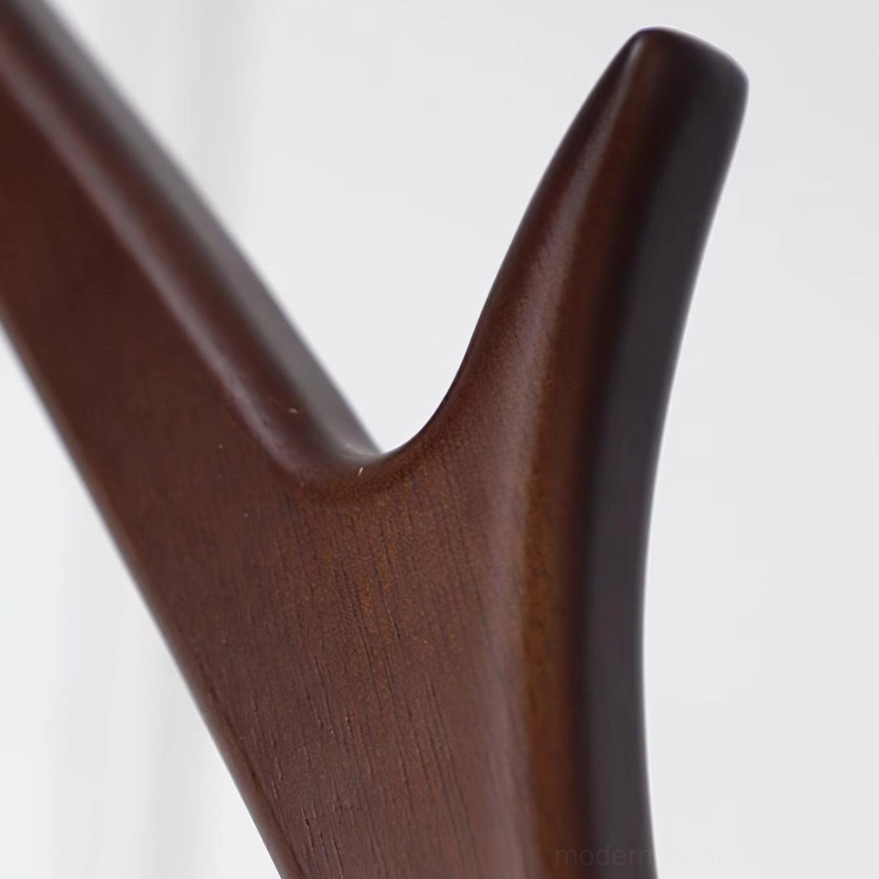 Artisanal floor lamp with curved wooden pole side table and fabric lampshade complete product view