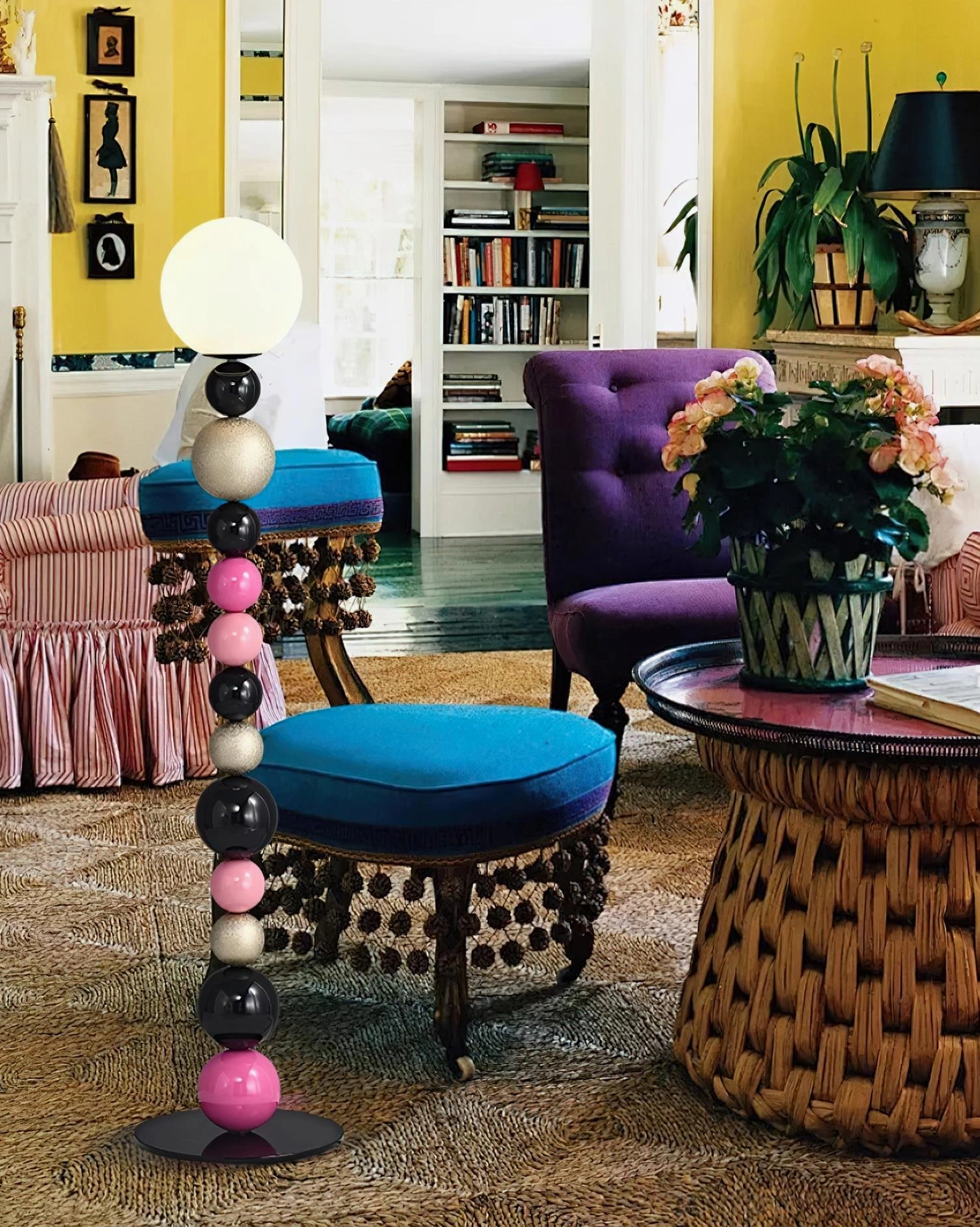 Multi-bead floor lamp in vintage living room with wicker furniture and purple sofa, eclectic home décor
