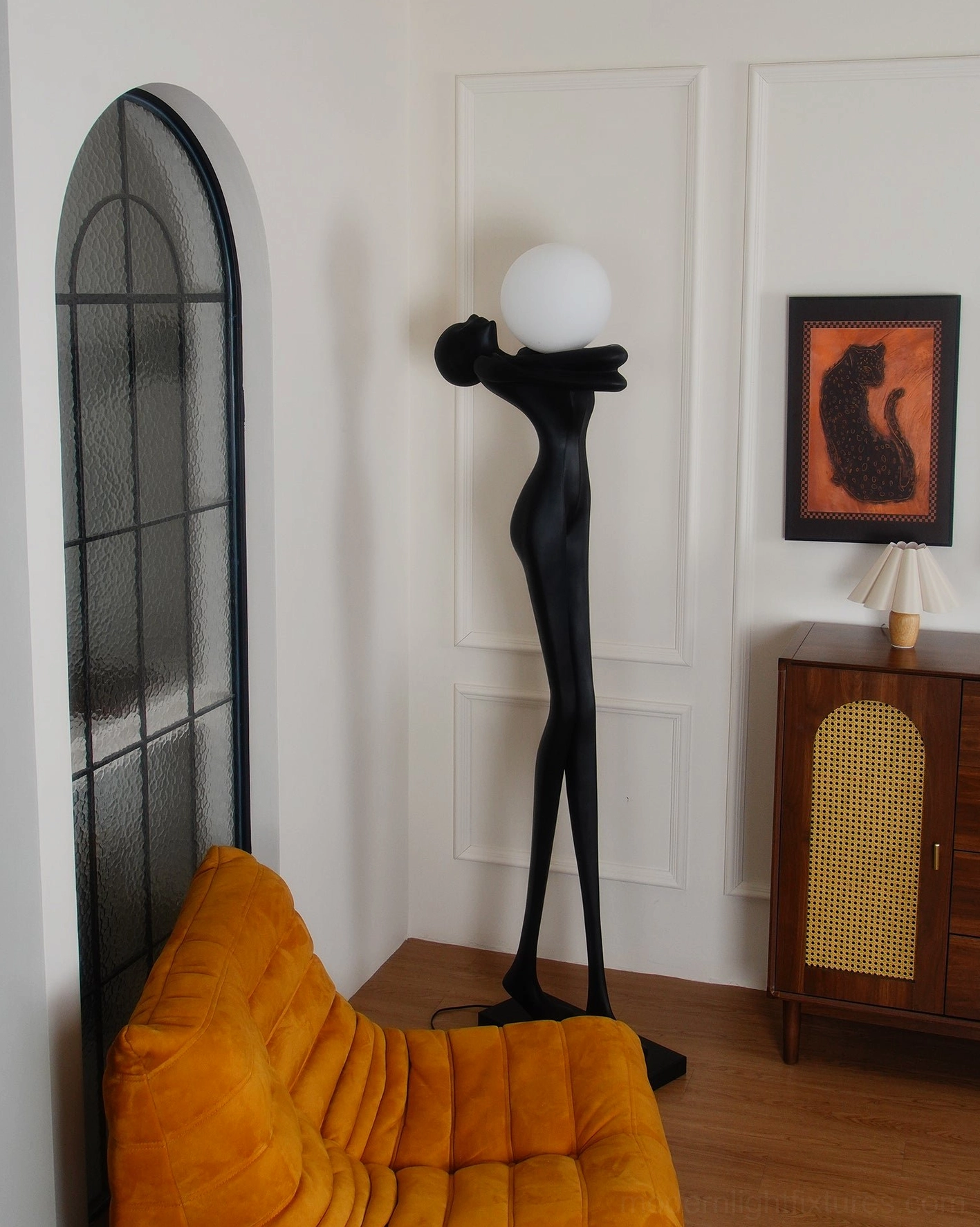 Artistic human form floor lamp contemporary setting, frosted globe light, modern minimalist design