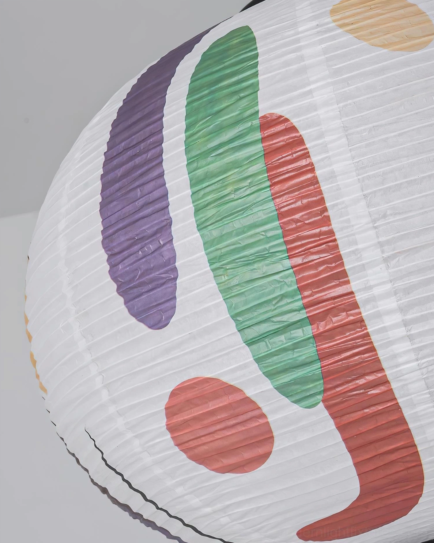 Artistic suspension pendant light featuring layered construction and hand-painted patterns creating sophisticated ambient lighting atmosphere