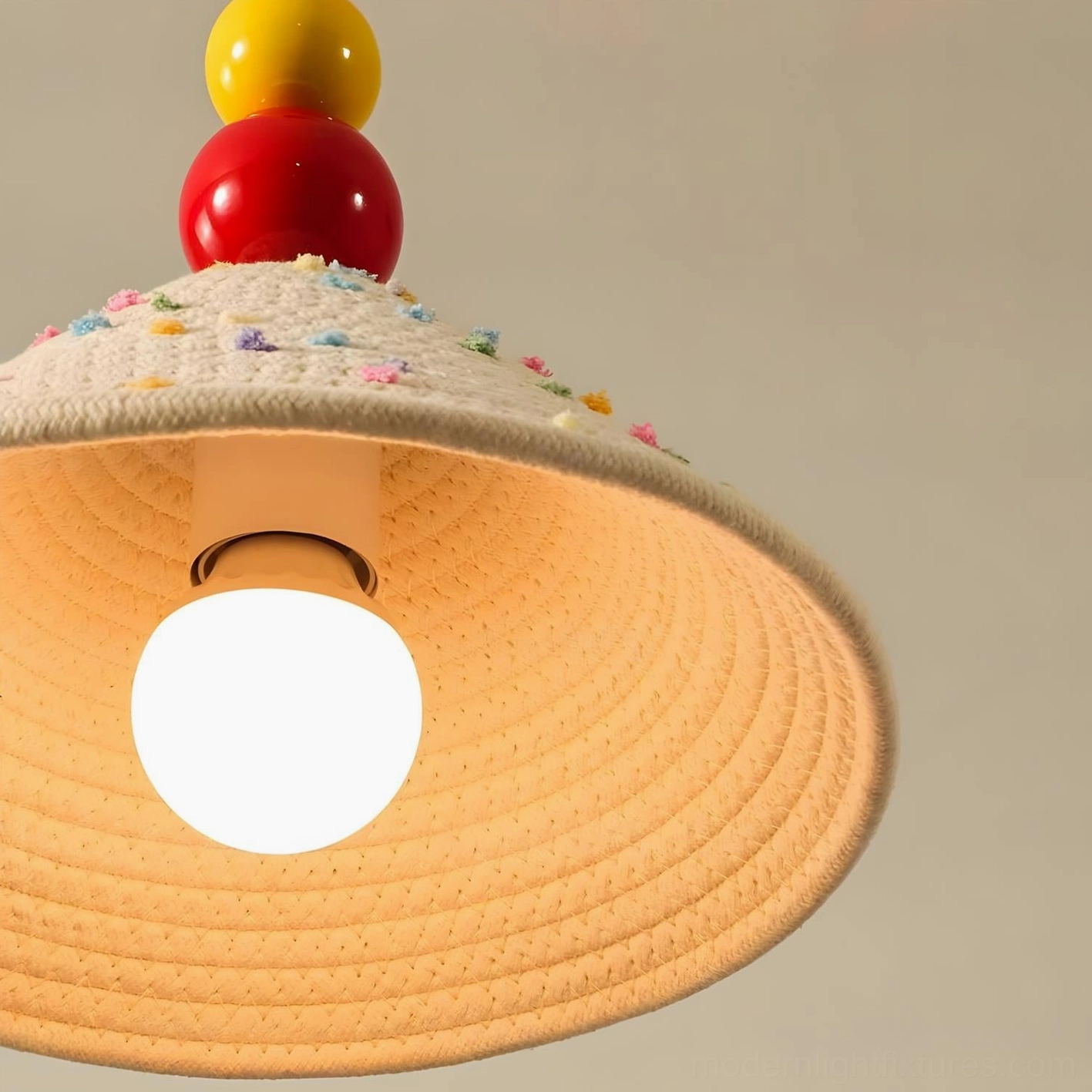 Handwoven pendant wall sconce with vibrant red yellow and beige palette in artistic modern setting