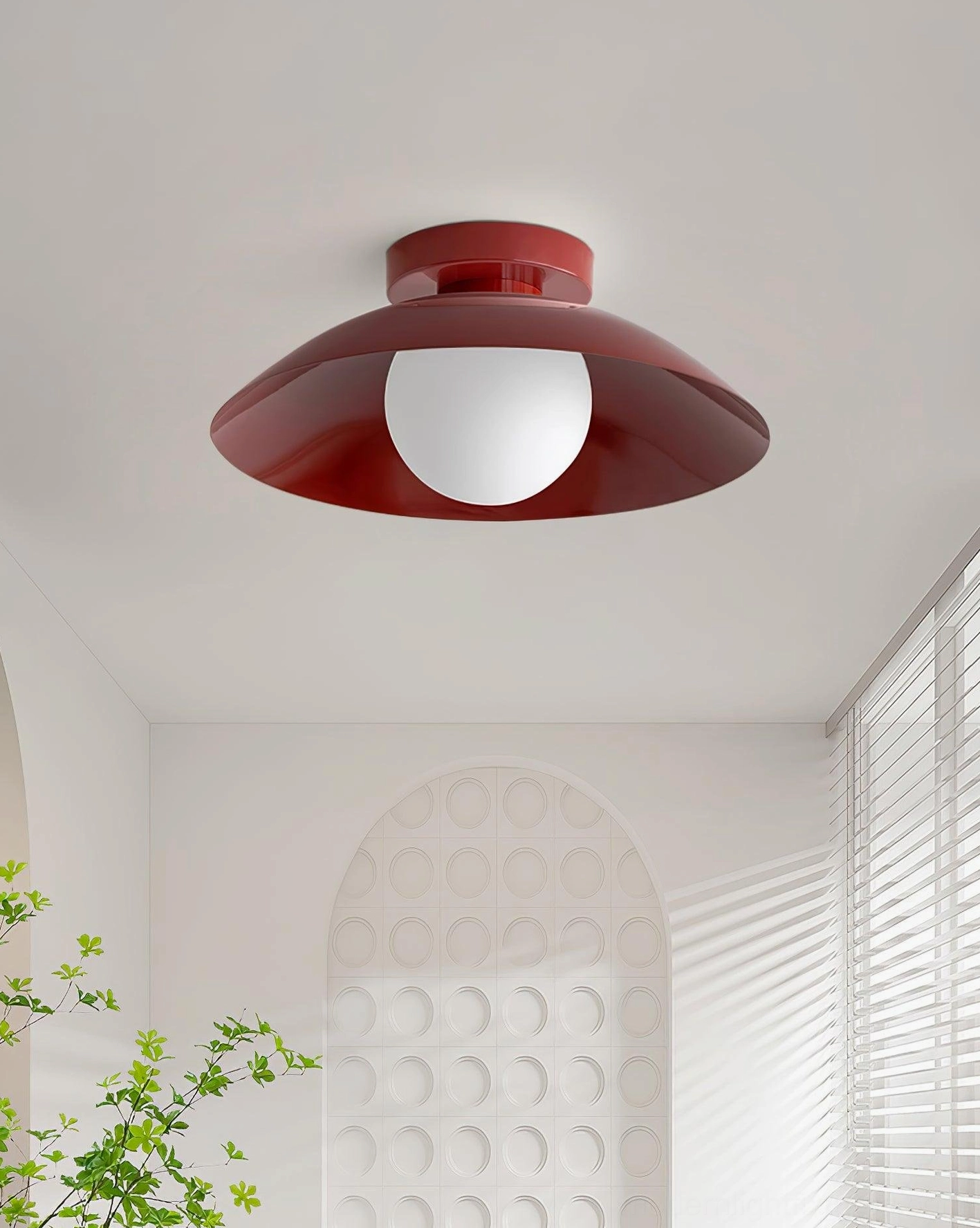 Burgundy flush mount Arundel Orb light in contemporary residential hallway ceiling perspective