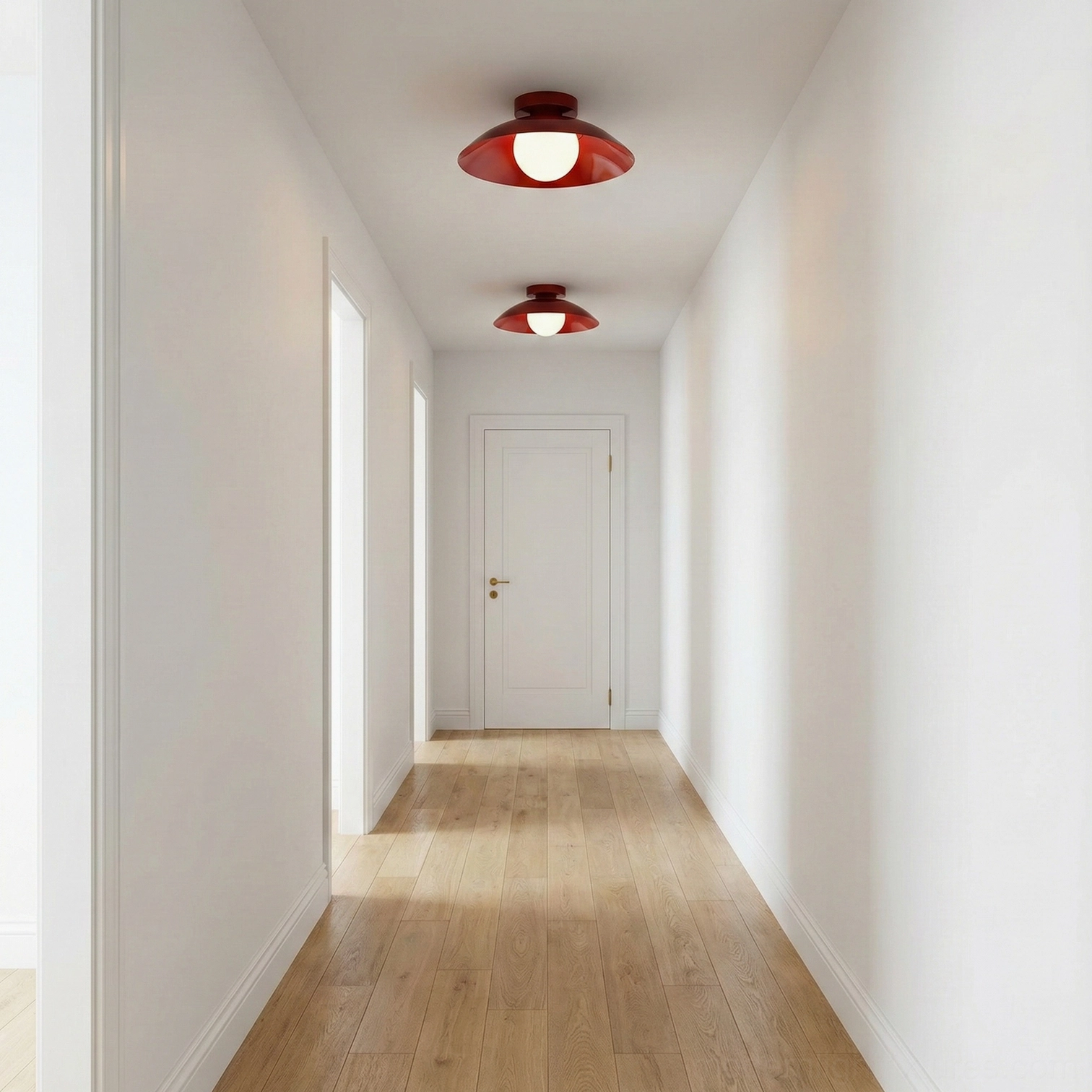 Two Arundel Orb ceiling fixtures in minimalist hallway with light wood flooring and white walls