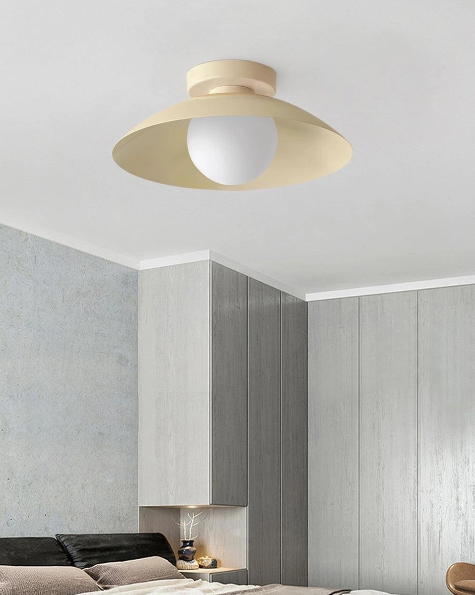 Arundel Orb ceiling fixture displaying sculptural design and glass globe illumination