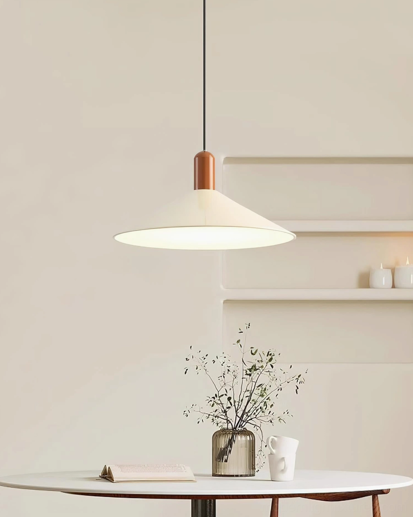 Arundel cone pendant light eye-level view, minimalist dining table setting with off-white shade and wooden top cap