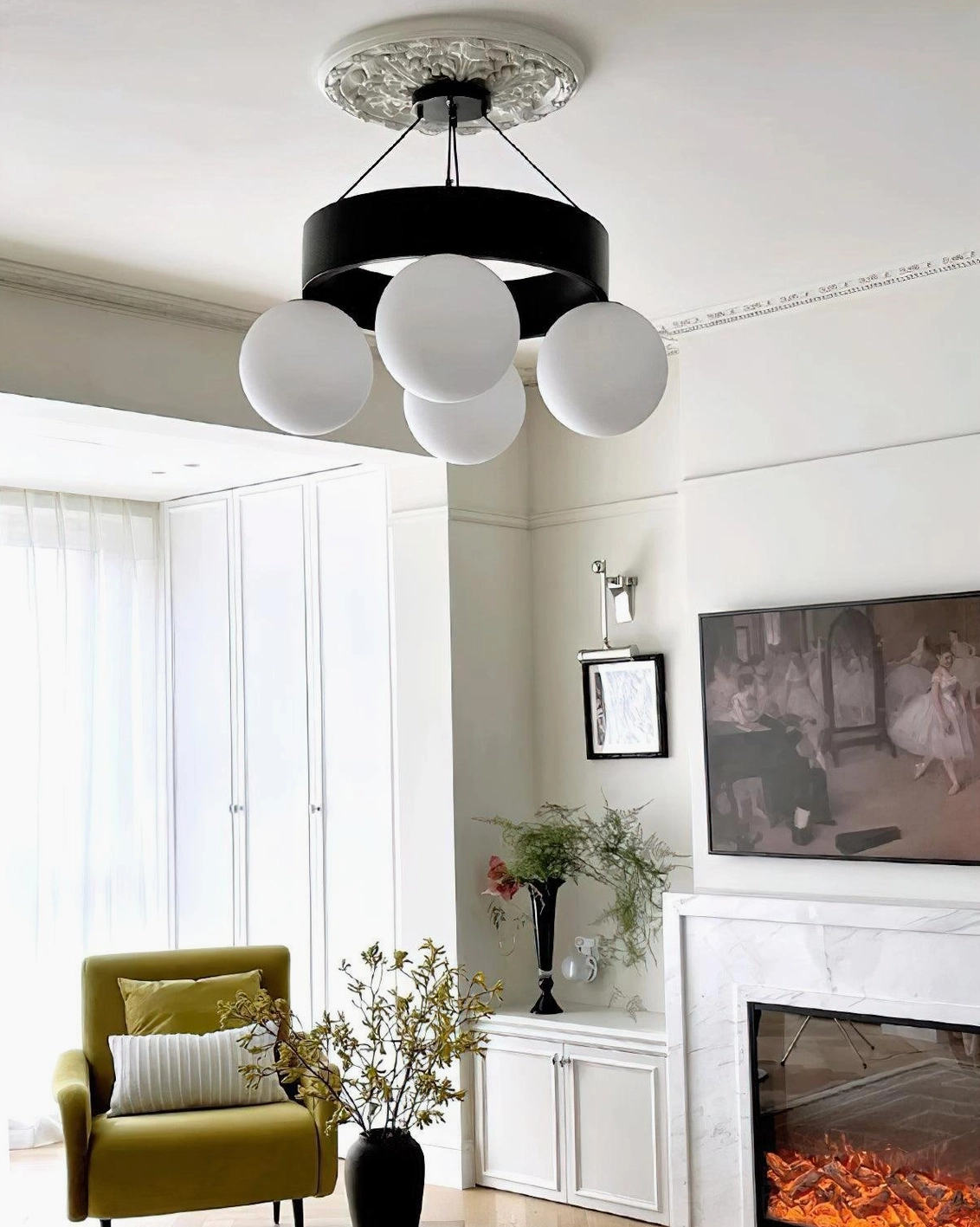 Asterios black metal ring globe chandelier showing complete fixture design and suspension system