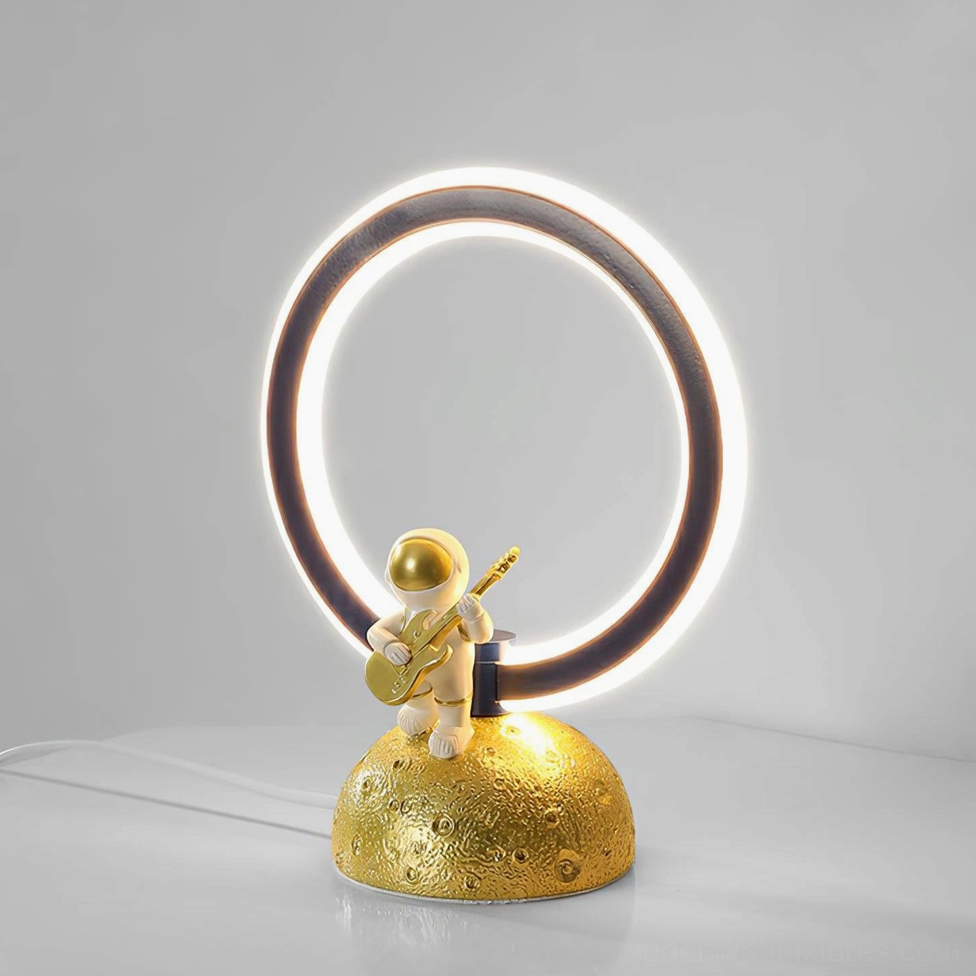 Astronaut table lamp detail shot lunar textured base craftsmanship