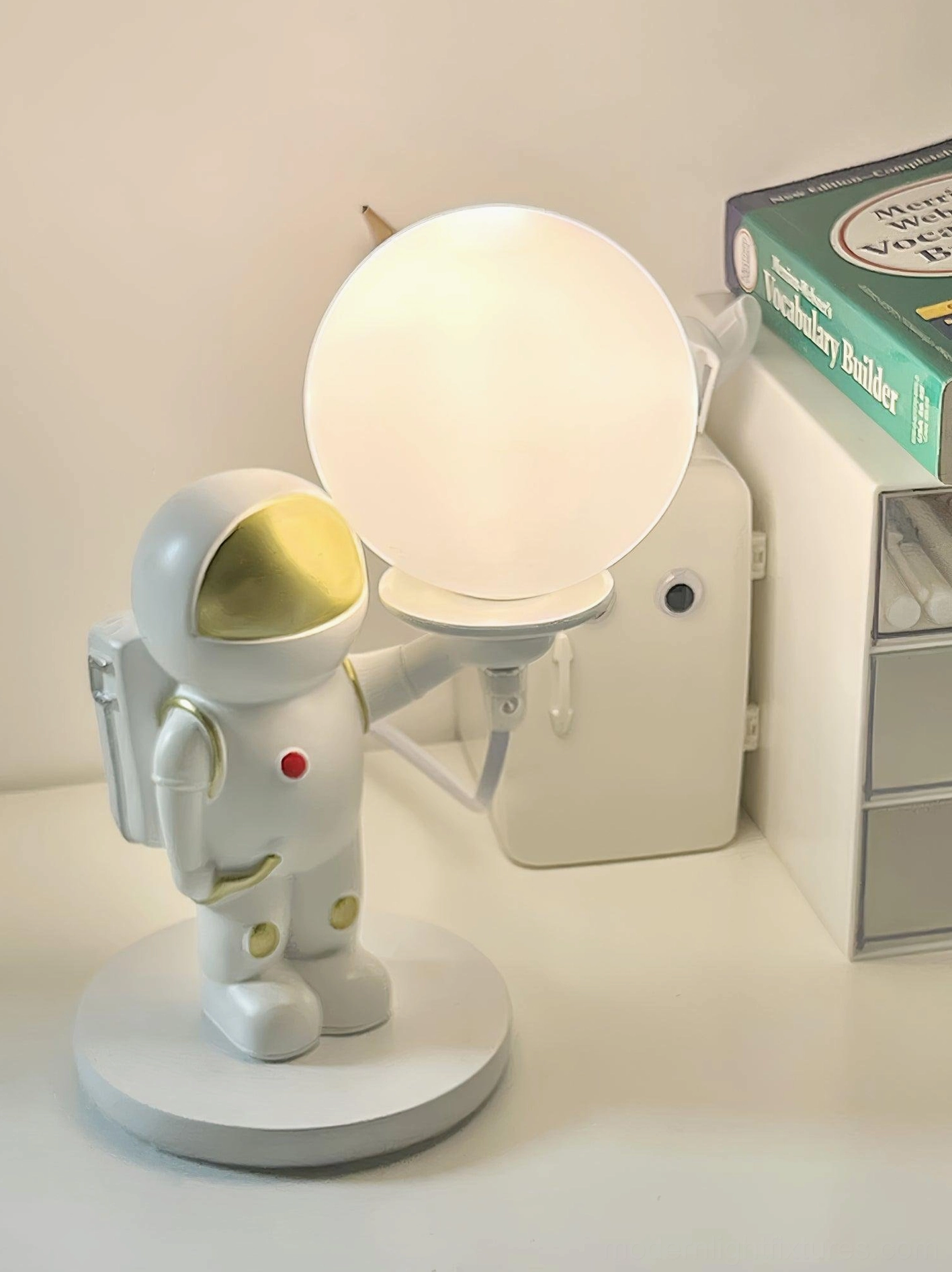 Astronaut lamp style A small compact table lamp white background