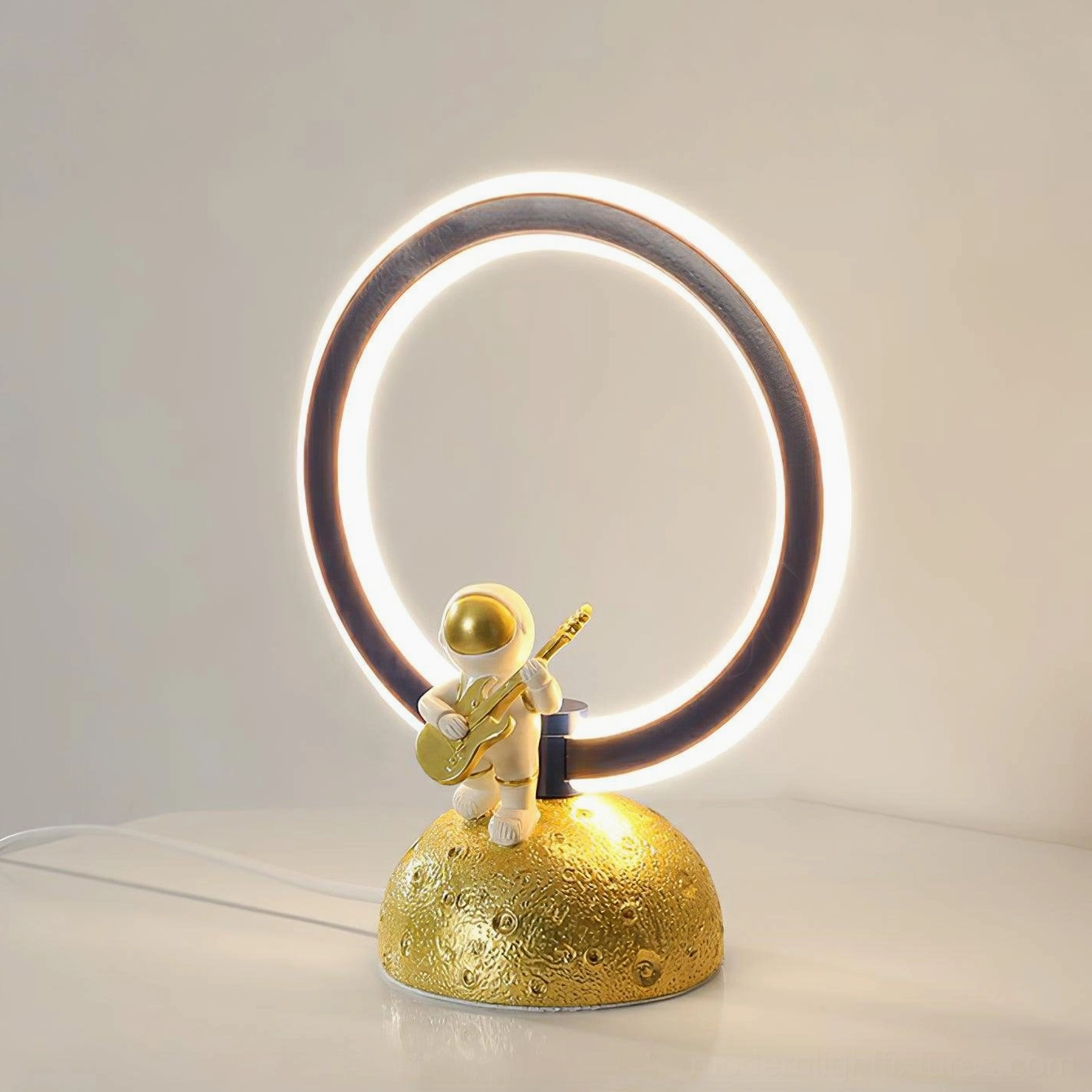 Astronaut table lamp illuminated showing 3000K warm white LED output