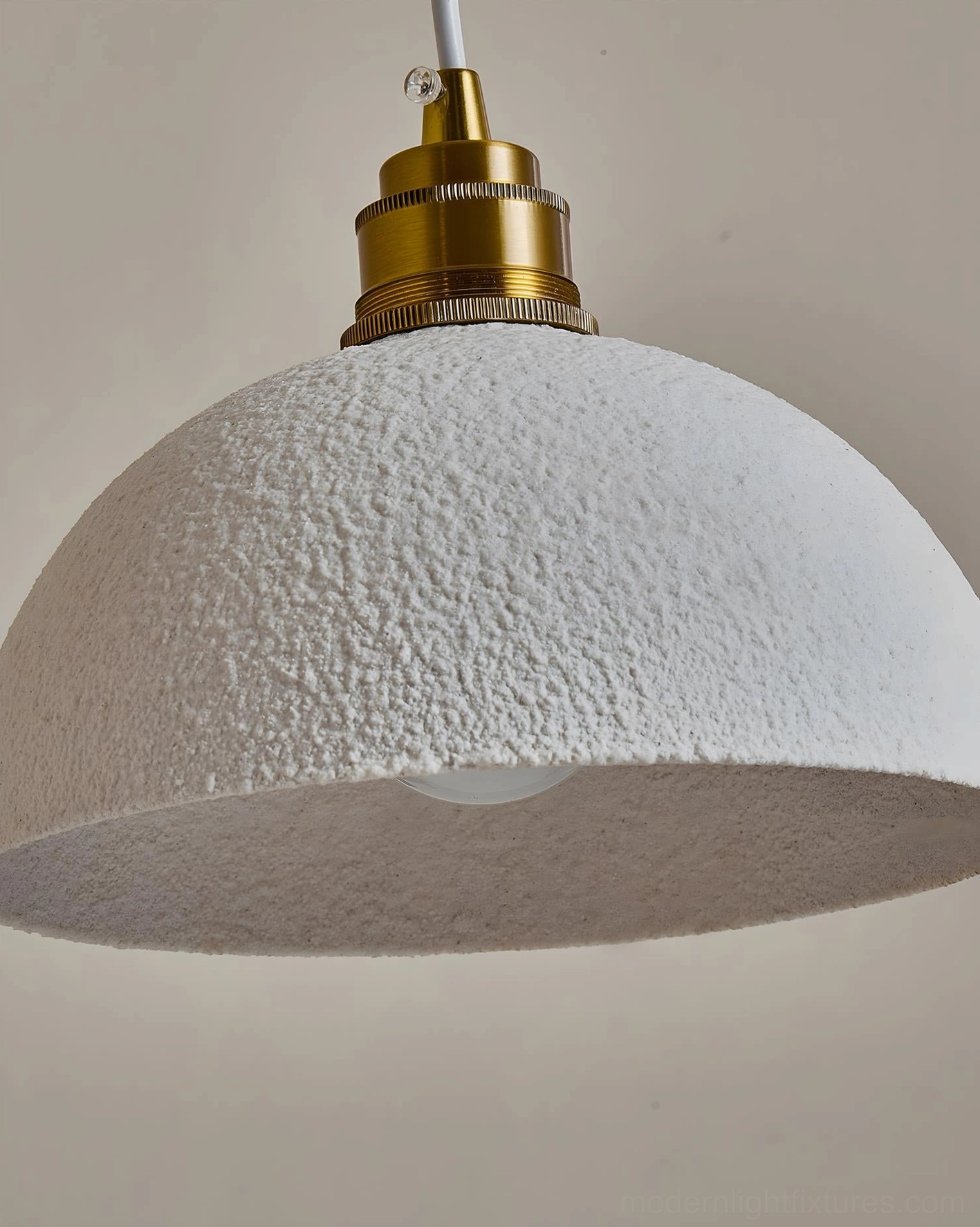 Aura Bell Model B pendant light isolated product view showing proportional dome shade and brass accent hardware detail