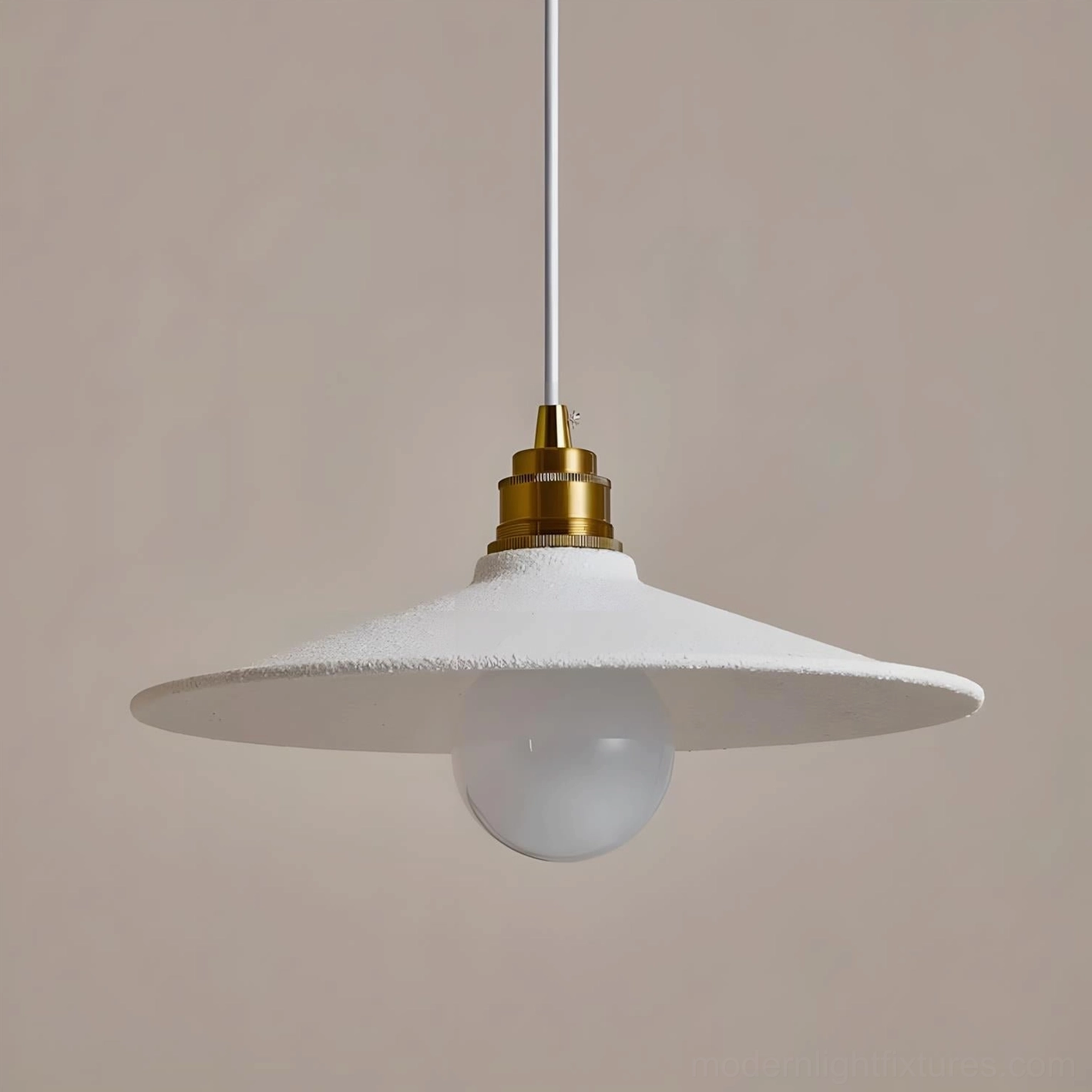 Series of Aura Bell pendant lights creating cohesive minimalist lighting design across contemporary residential interior