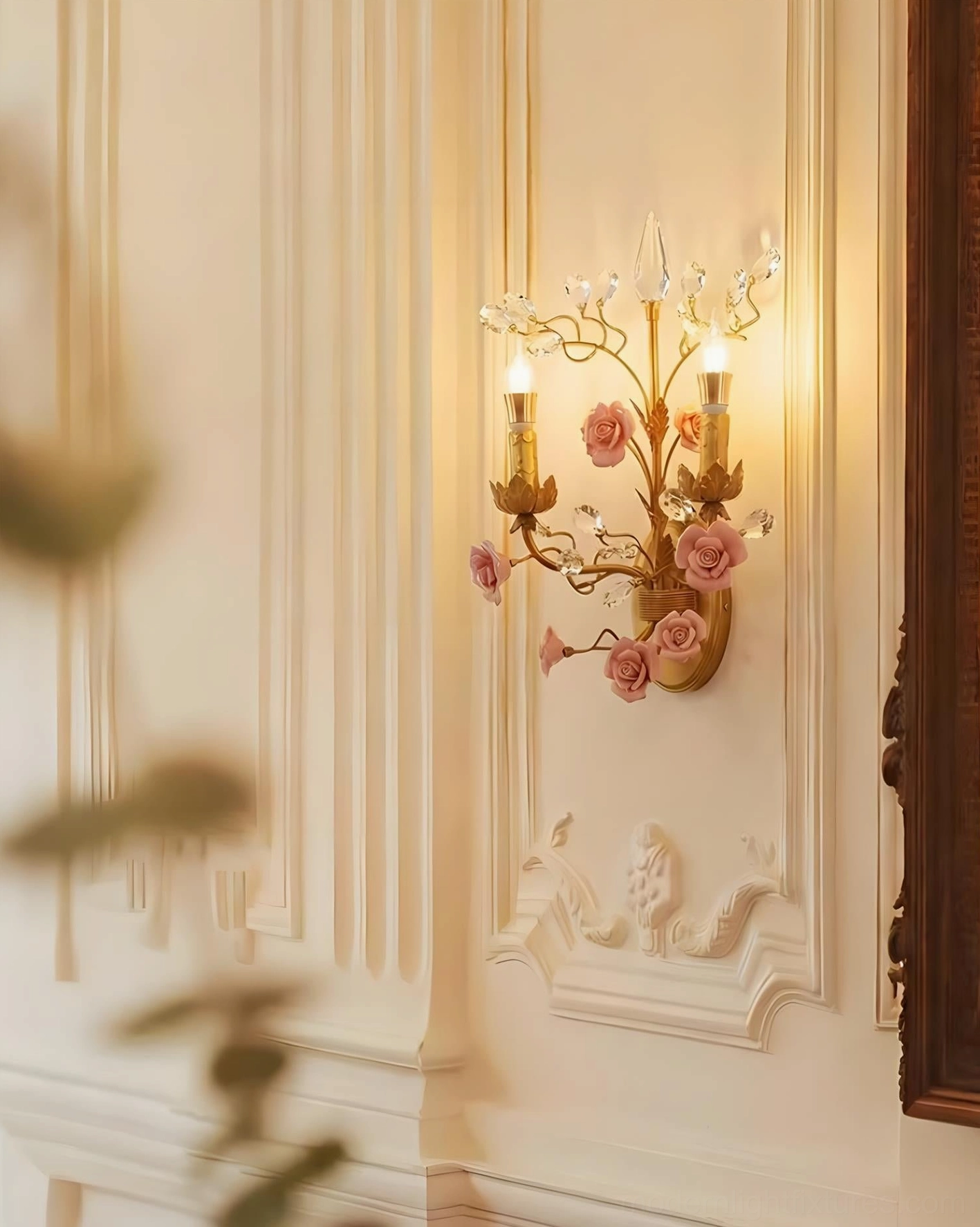 Aureflora crystal floral wall sconce on classic paneled wall with French neoclassical style ambient lighting