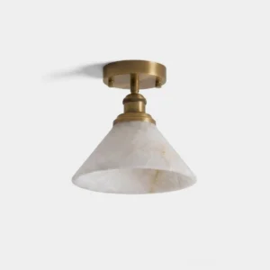 Aurelia natural alabaster semi-flush ceiling light with hand-carved stone cone and warm brass canopy, studio product shot on white background showing full fixture design