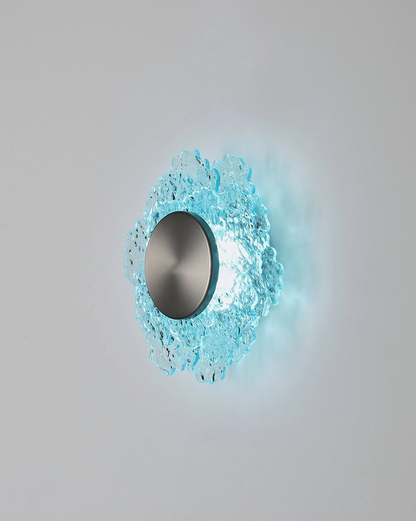 Aurelia textured glass wall sconce sculptural form highlighting botanical-inspired petal structure