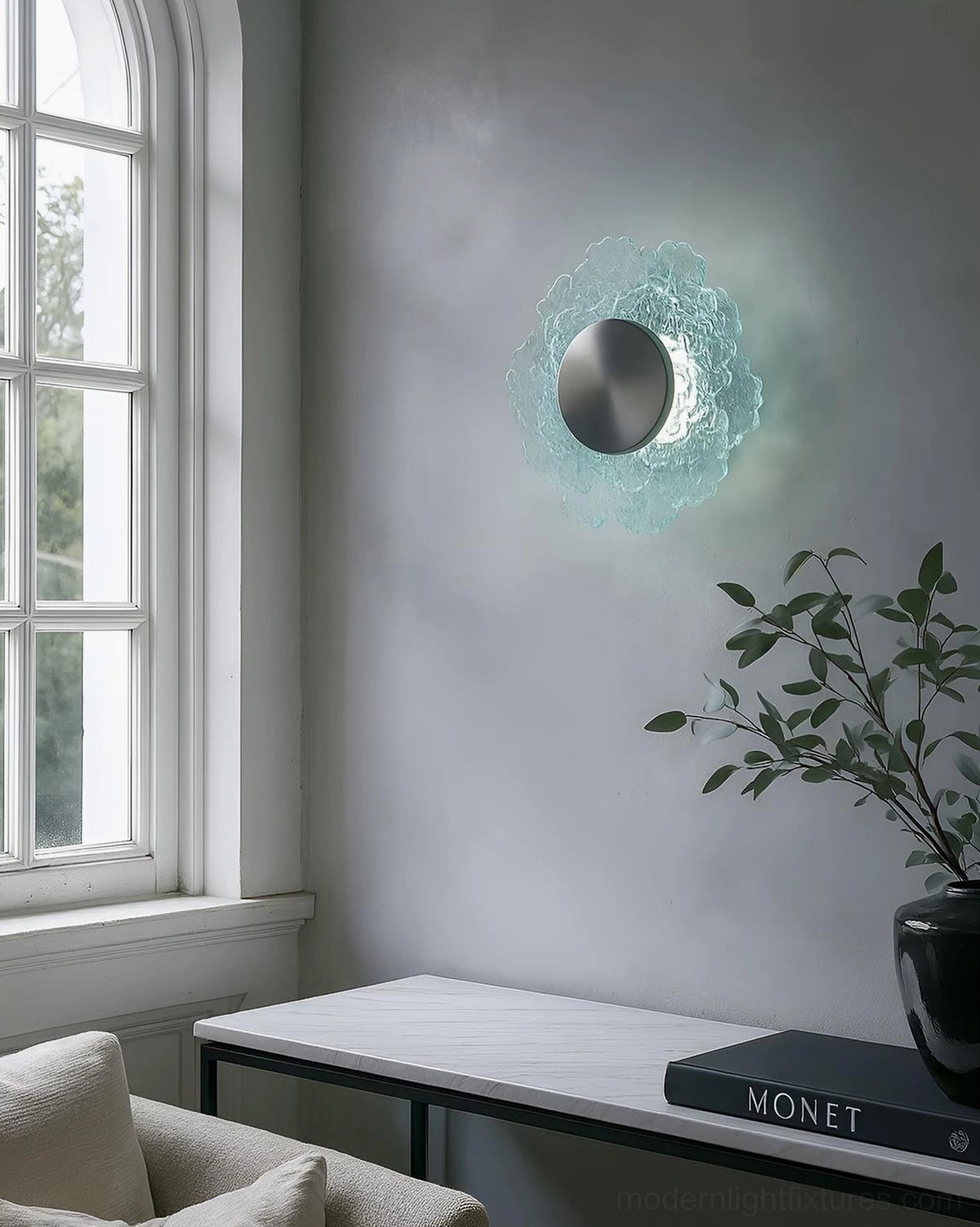 Aurelia sculptural wall light in minimalist home office with green plant and bookshelf styling