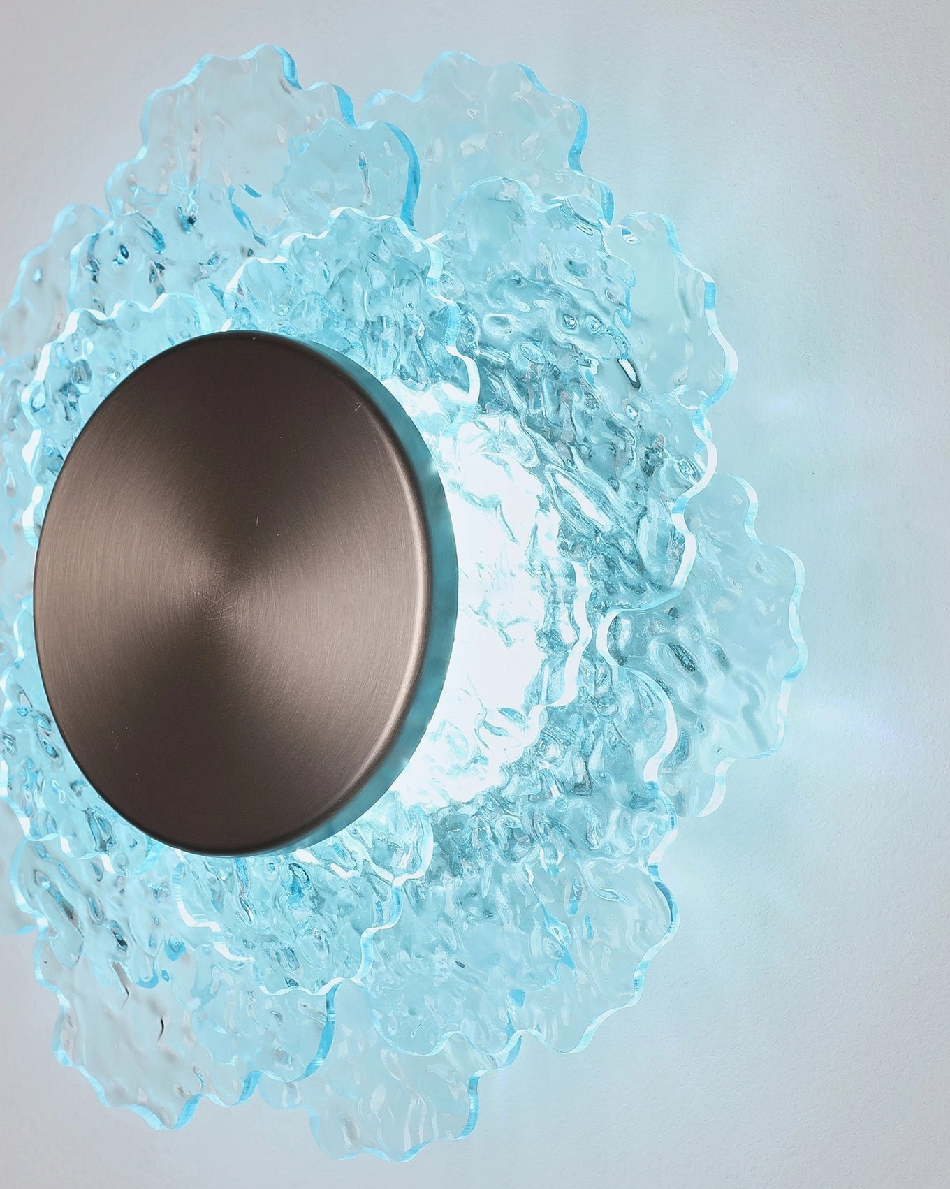 Aurelia modern wall sconce premium styling shot emphasizing sculptural quality and ambient illumination