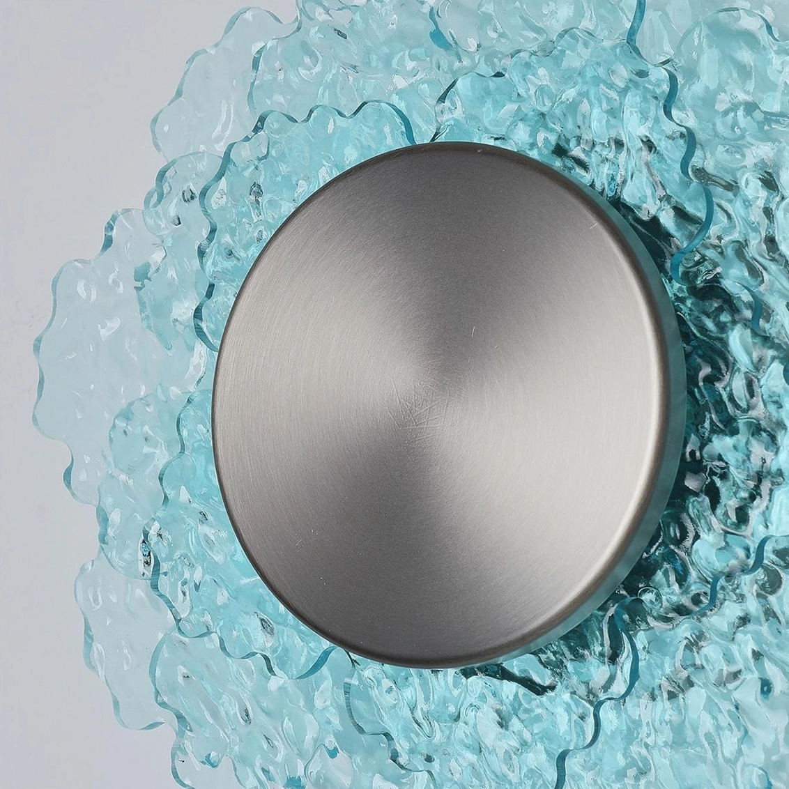 Aurelia contemporary wall sconce from side perspective showing three-dimensional glass petal layering