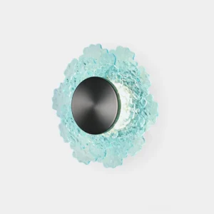 Aurelia modern wall sconce with textured glass petals and brushed metal base, front studio view