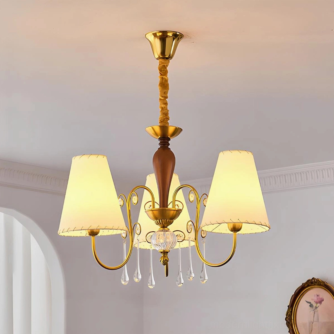 Aurembra multi-arm fabric chandelier low-angle upview in arched hallway brass wood frame crystal pendants warm illumination