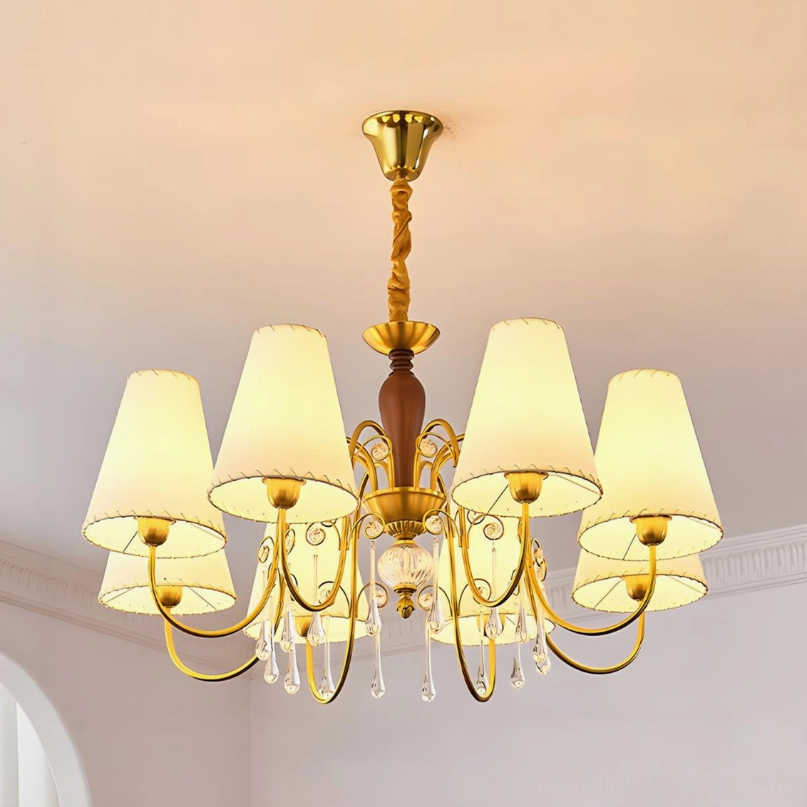 Aurembra six-arm lit vintage chandelier frontal close-up illuminated with warm yellow fabric shades and crystal decorations