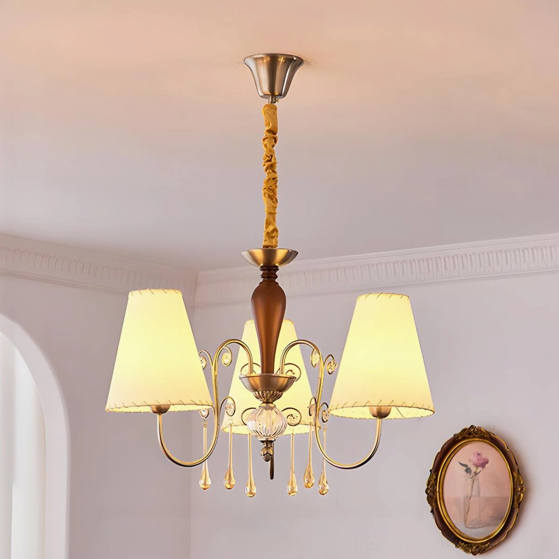 Aurembra retro four-arm chandelier low-angle indoor view in home hallway with mixed metal finish and off-white lampshades