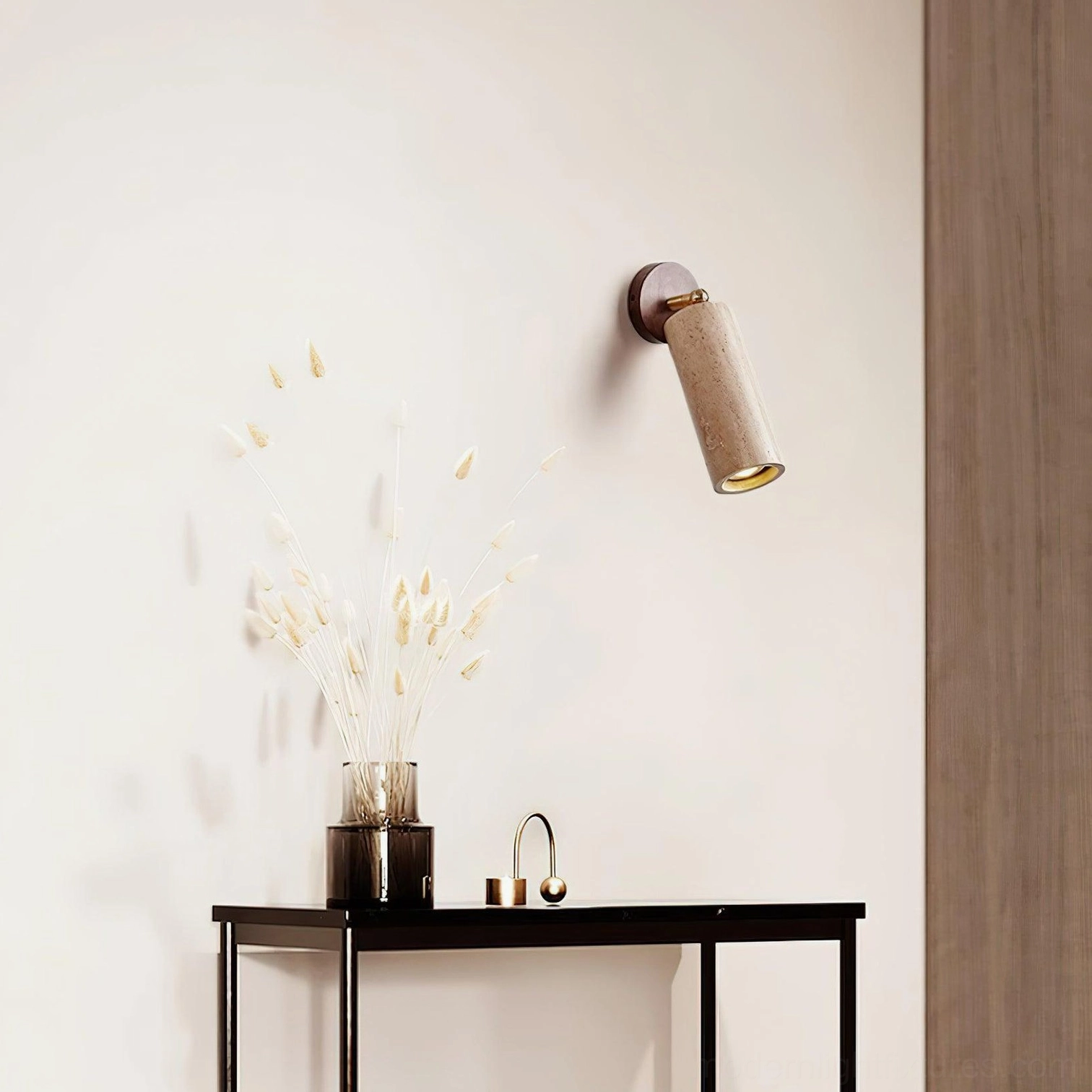 Mireille travertine wall sconce close-up showing natural surface texture pores and authentic stone character
