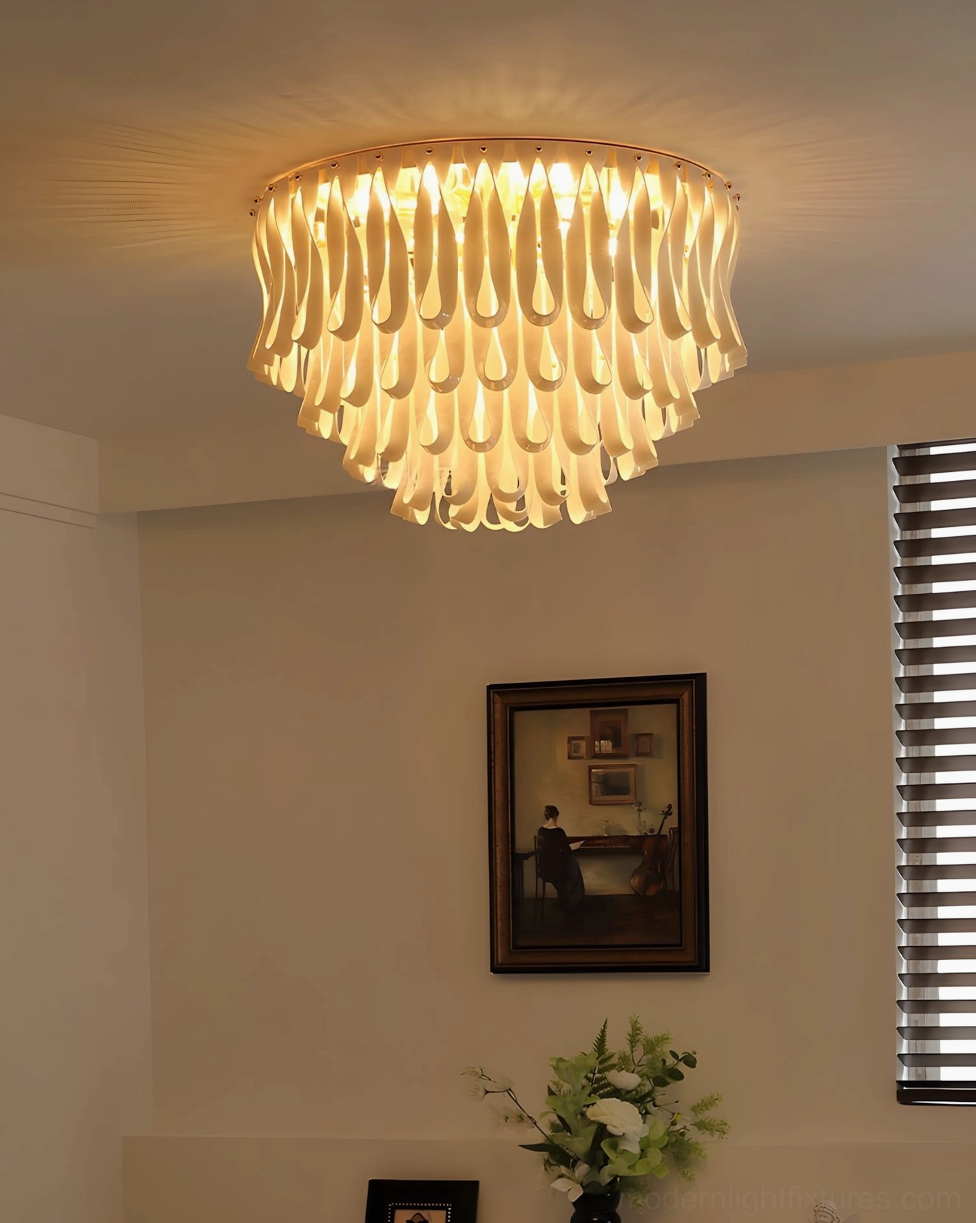 Avelisse flush mount overhead light in warm minimalist bedroom with neutral luxury decor and framed art