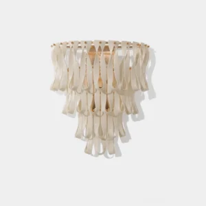 Avelisse ceramic ribbon wall sconce front view with matte white finish and warm gold metal accents on white background