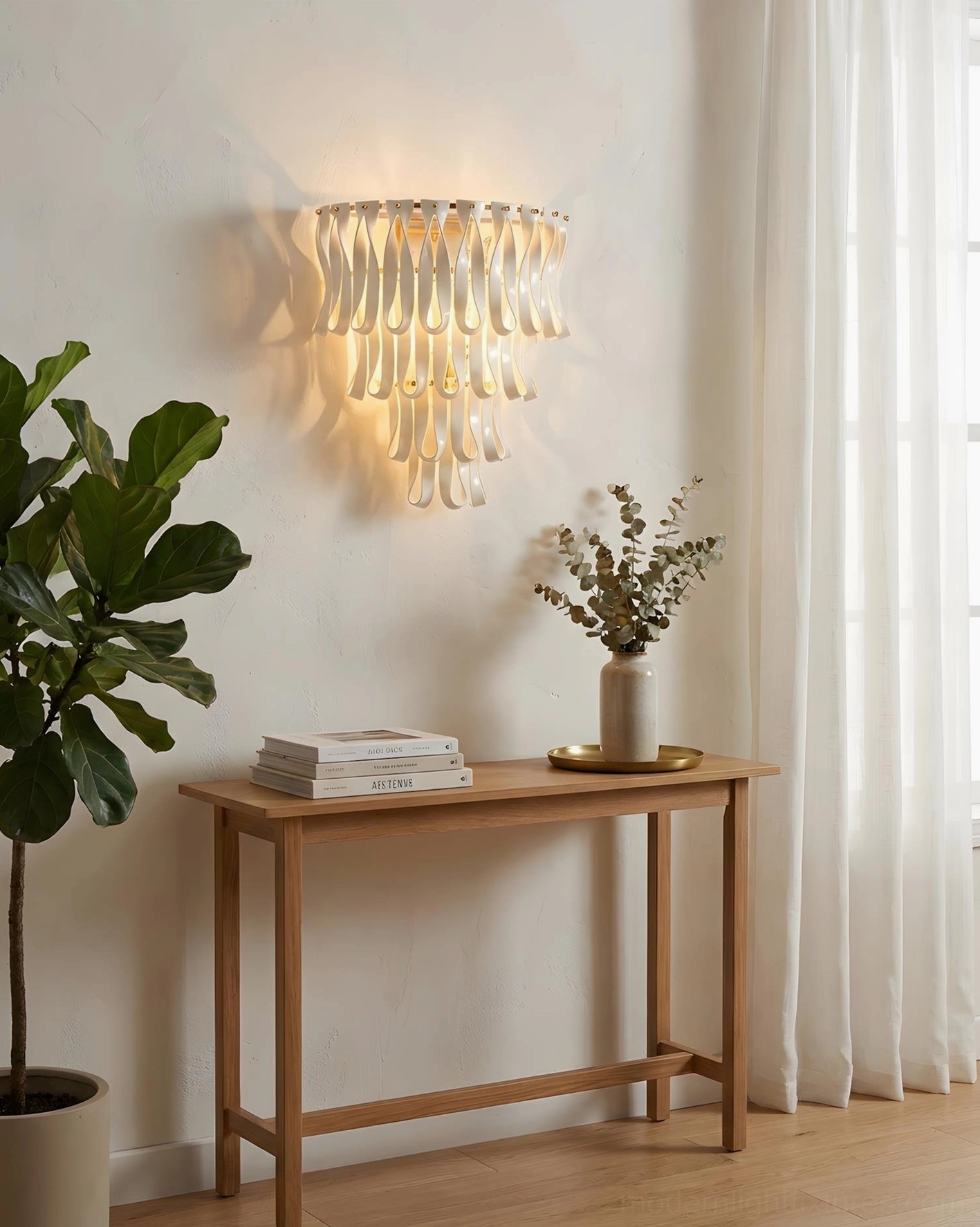 Modern ribbon wall sconce mounted above wooden console table in minimalist entryway with warm glowing light