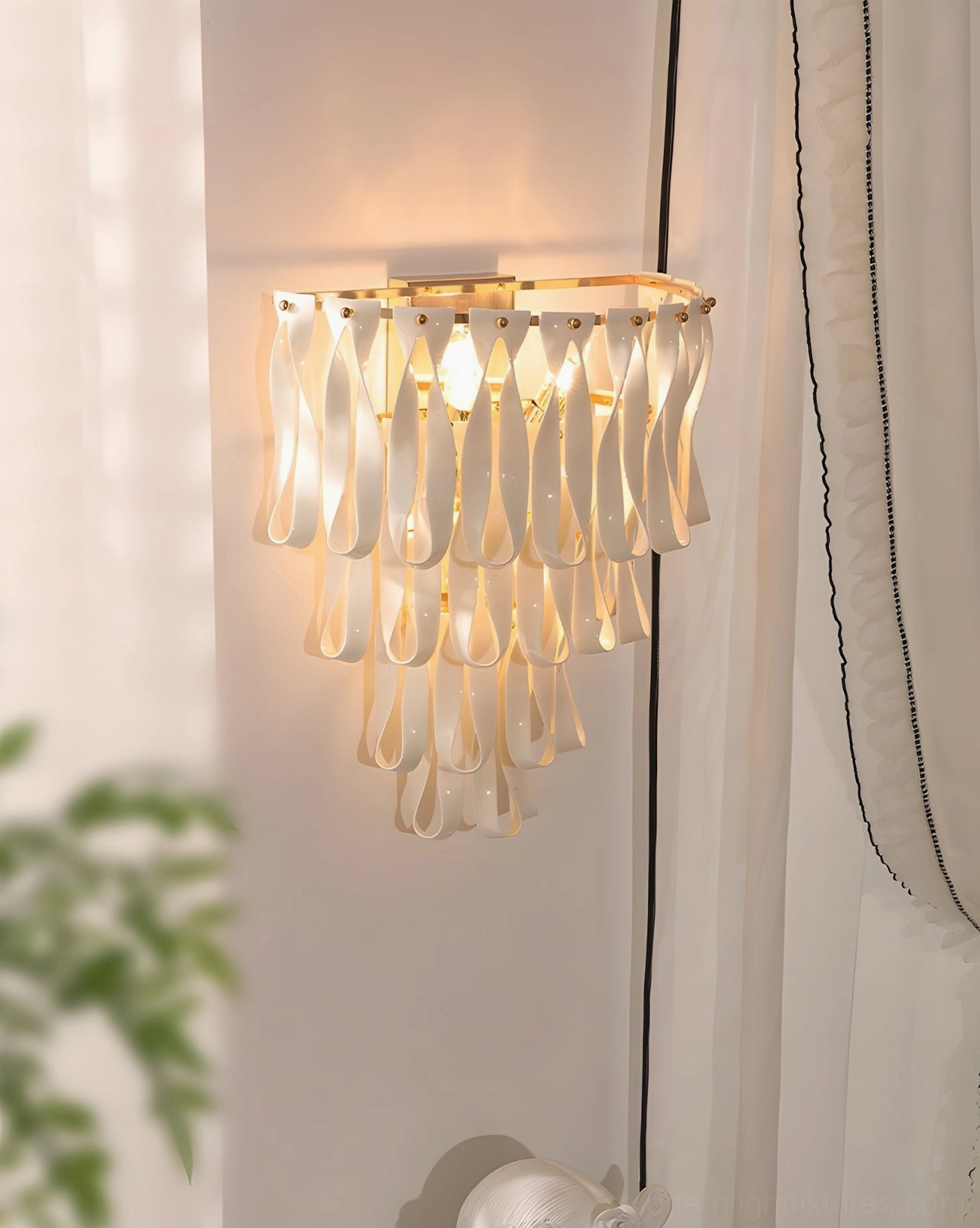 Sleek romantic vintage design ceramic ribbon wall sconce with gold metal frame in minimalist home interior