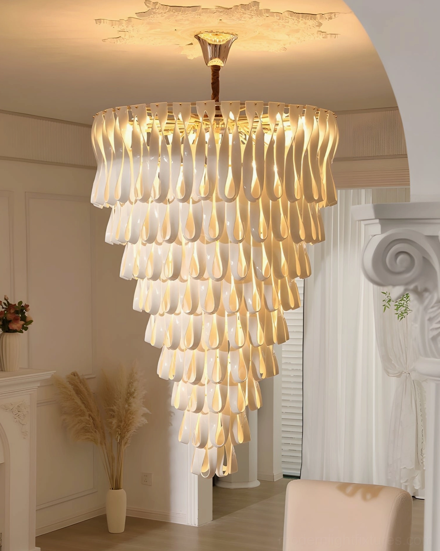 Avelisse spiral tiered cascade chandelier upward view with elongated layered design and gradient warm lighting