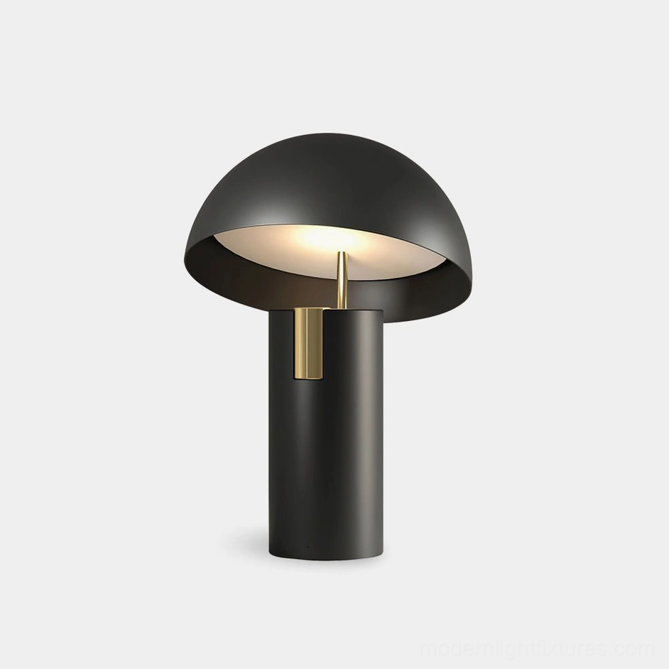 Avo modern mushroom LED table lamp with matte black finish and brass accent, front low angle view in studio lighting