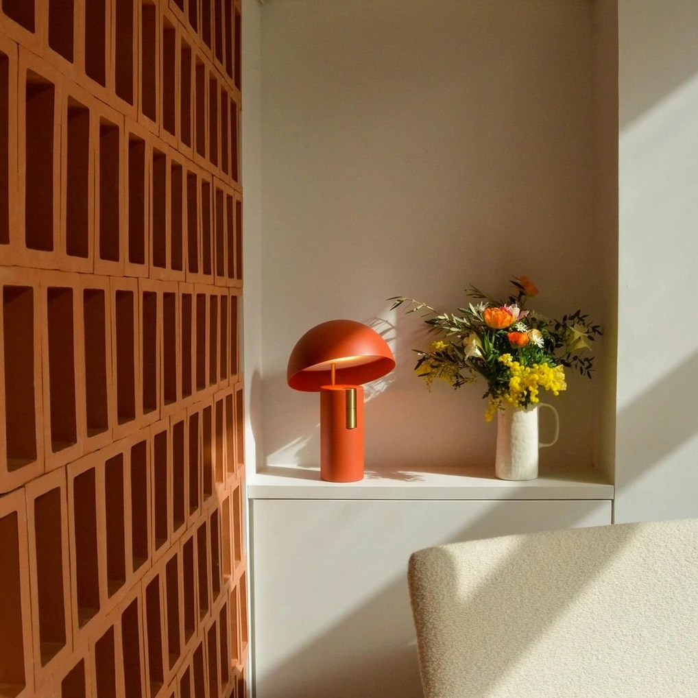 Avo table lamp in warm residential setting demonstrating versatile placement and ambient light quality
