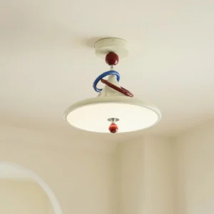 Avolis ceiling light fixture illuminated in beige residential interior, showcasing twisted red blue ring accents and warm ambient lighting in modern home