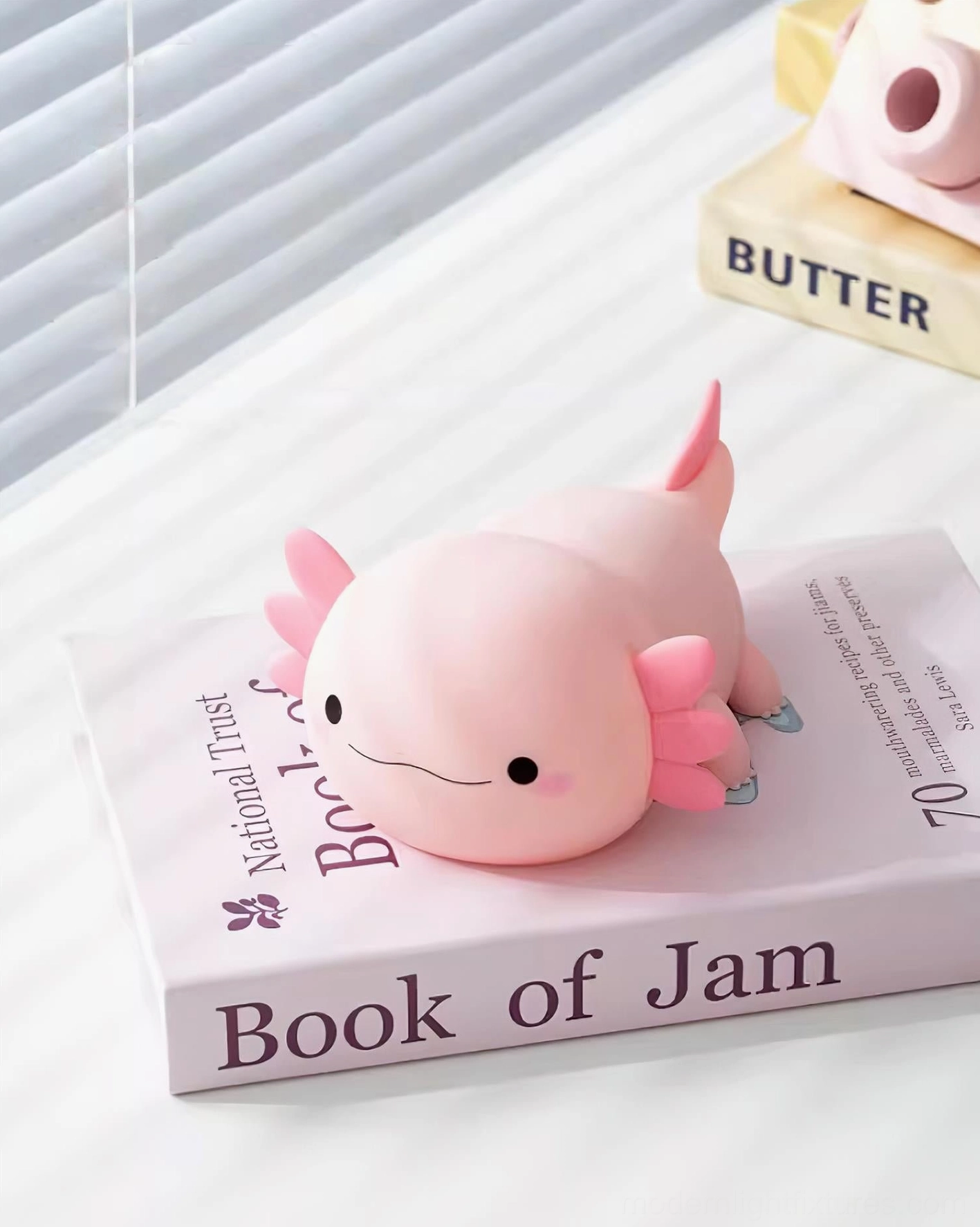 Pink silicone axolotl table lamp with pat switch control and long-lasting LED performance