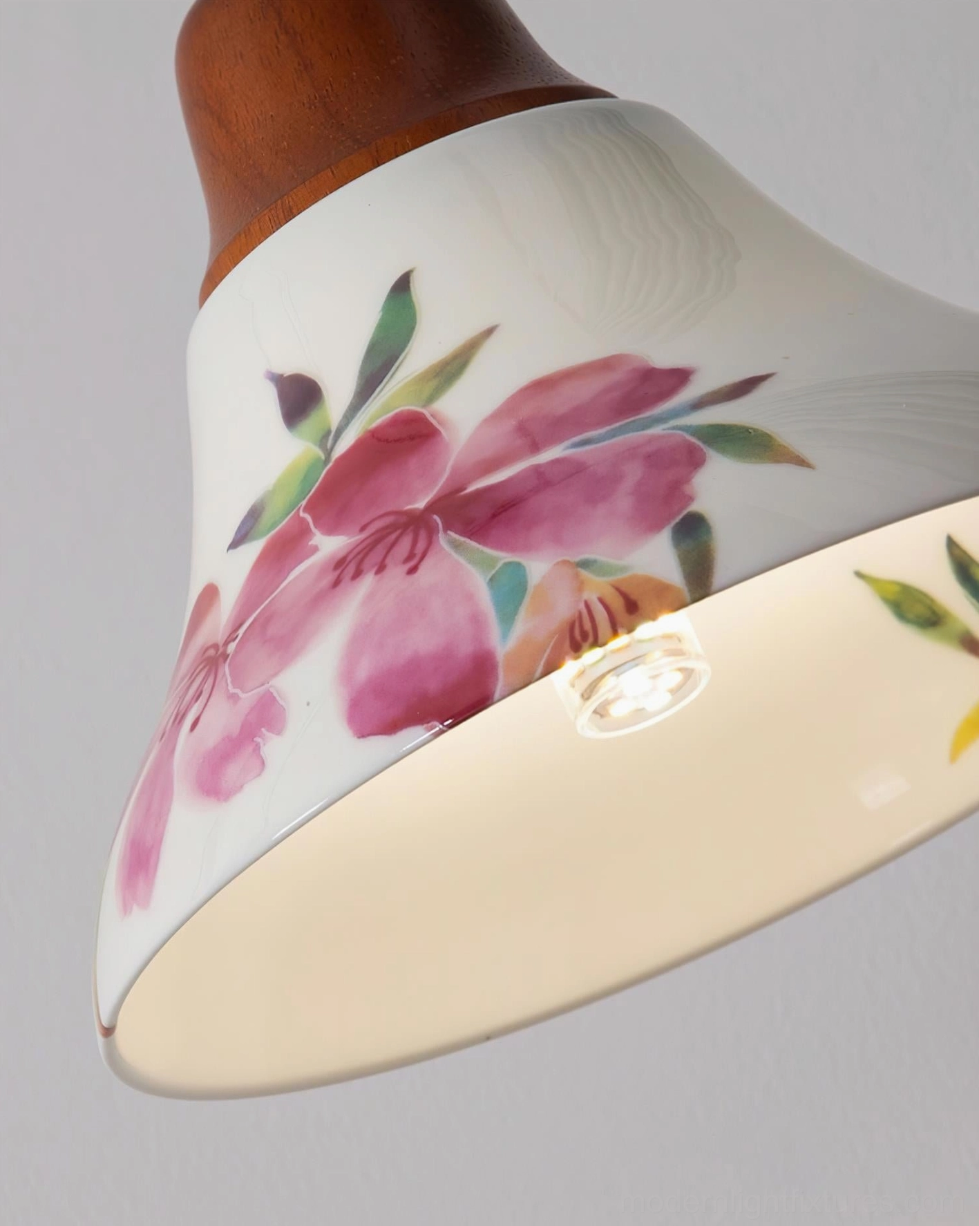 Azalea ceramic hanging pendant lamp installed in modern interior showing soft diffused light through painted floral porcelain shade