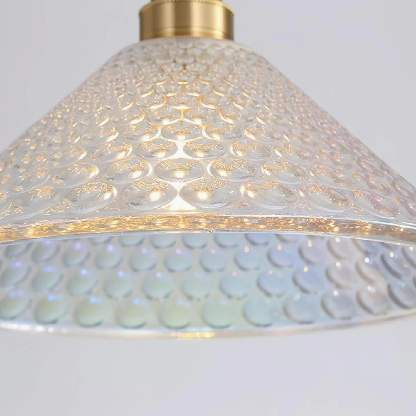 Multi-angle view of azure pendant lamp showcasing glass craftsmanship and feather embossed detailing