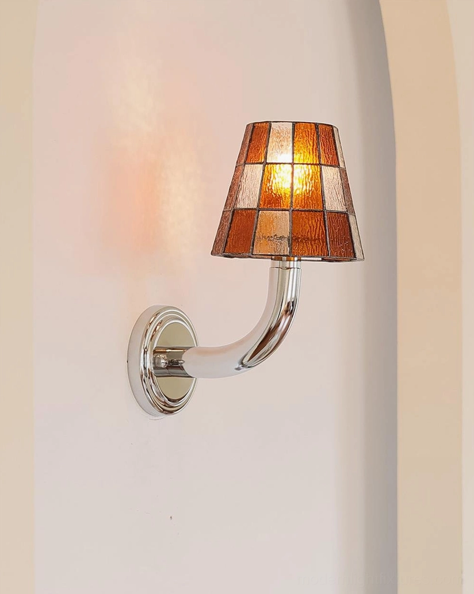 Azurielle amber checkered stained glass wall sconce side view with curved chrome arm and ambient light