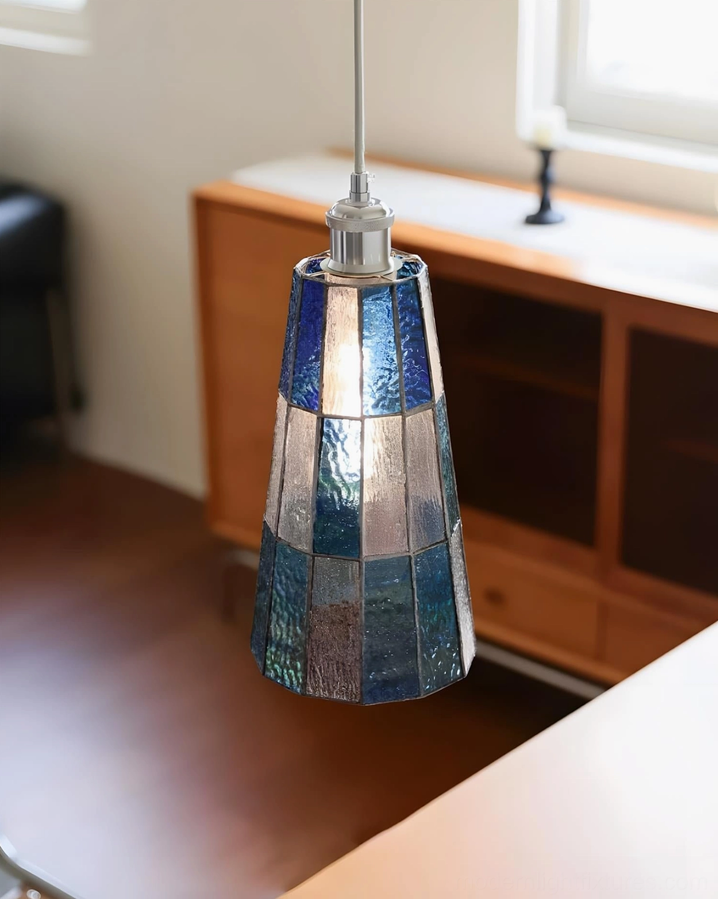 Azurielle blue stained glass pendant light in mid-century modern dining room aesthetic