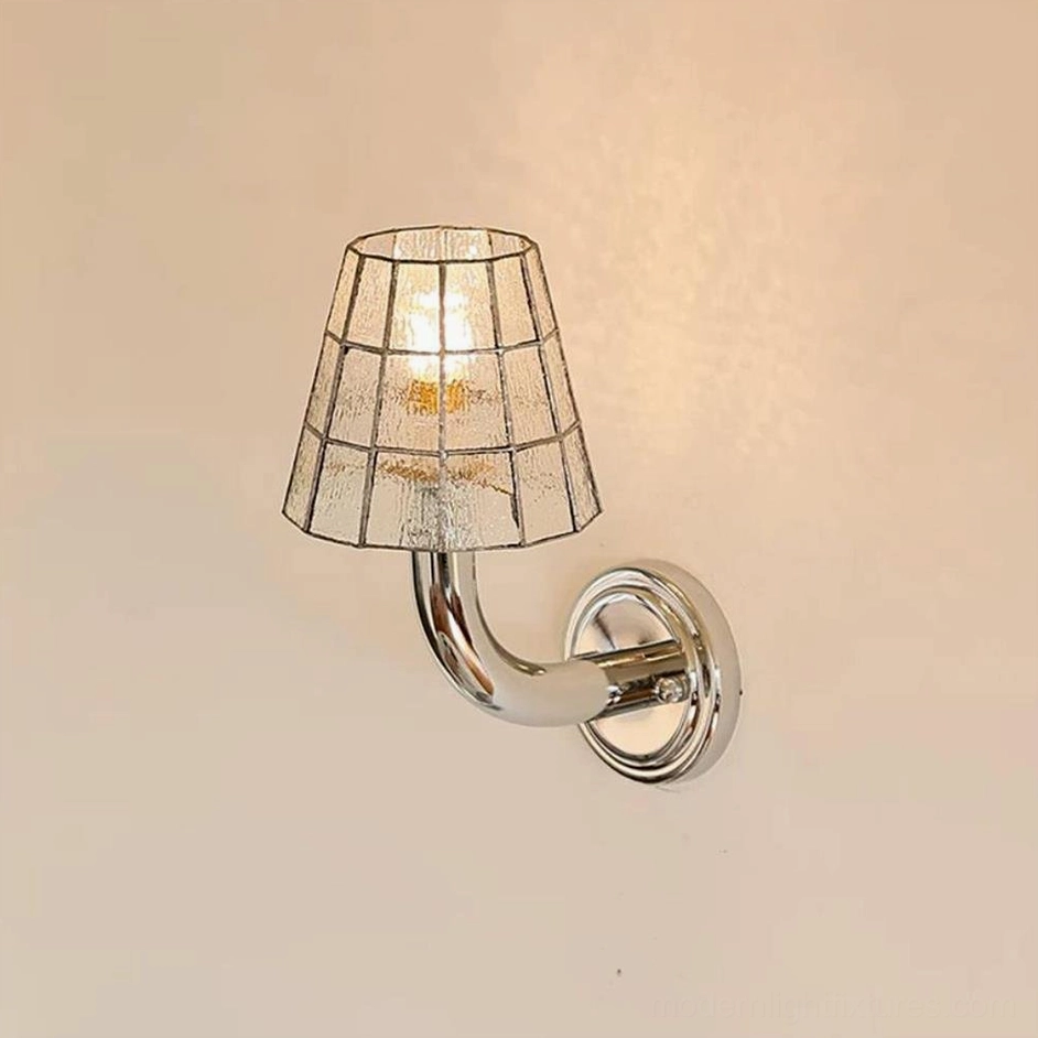 Azurielle clear stained glass wall sconce with grid pattern and polished chrome finish, glowing bulb visible