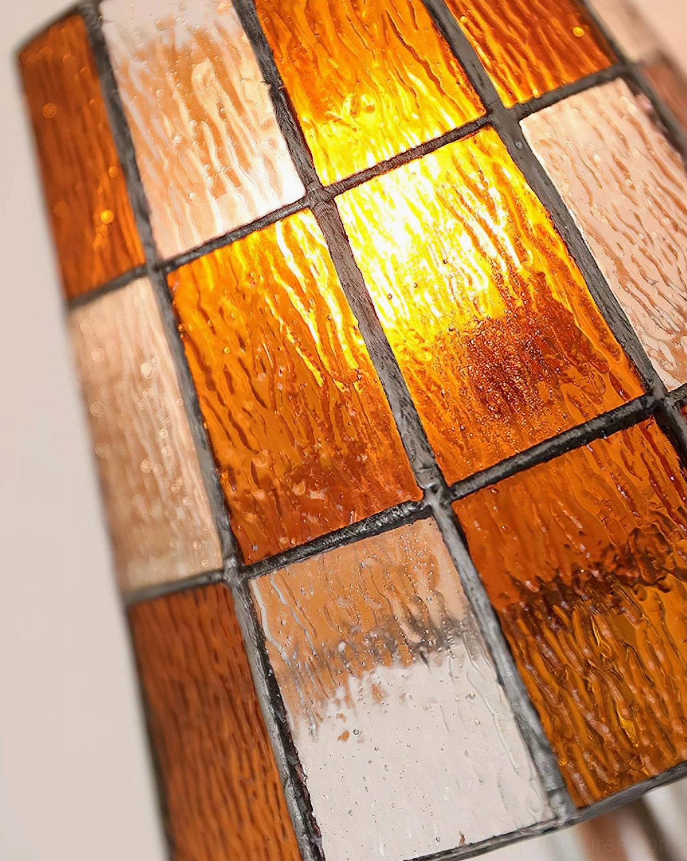 Azurielle stained glass wall light fixture showcasing color options and modern minimalist design aesthetic