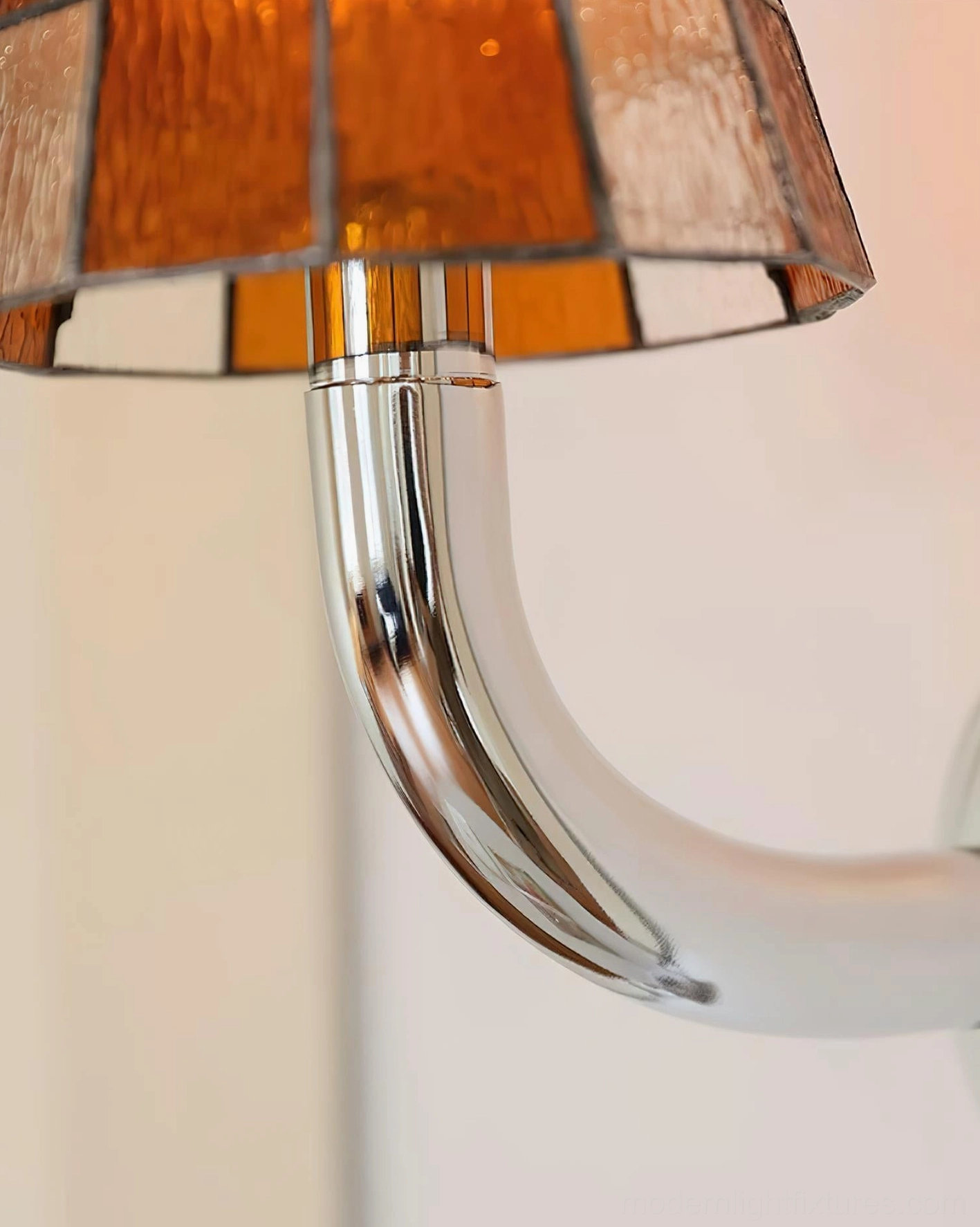 Azurielle modern stained glass wall sconce installed in contemporary interior space with ambient lighting