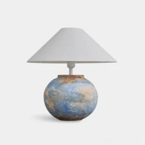 Bailey ceramic table lamp front view with hand-textured blue base on white background