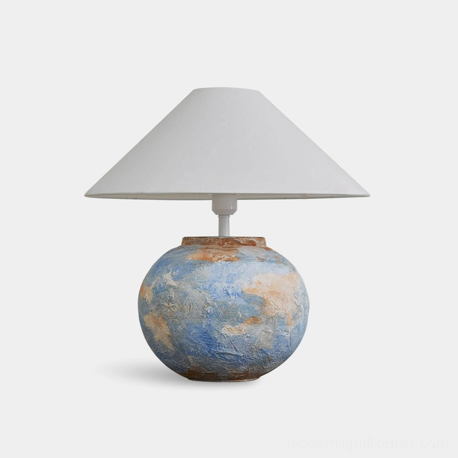 Bailey ceramic table lamp front view with hand-textured blue base on white background