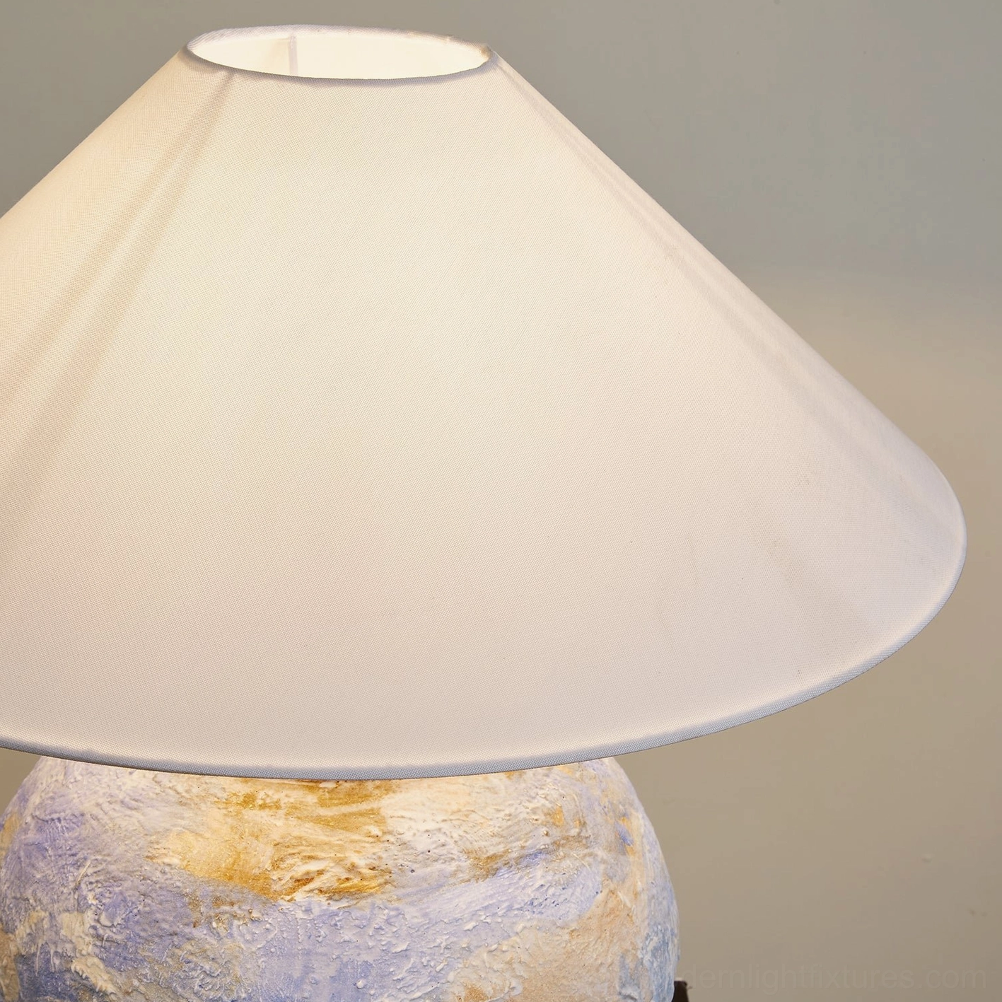 Bailey textured ceramic table lamp showing color gradient from blue to terracotta tones