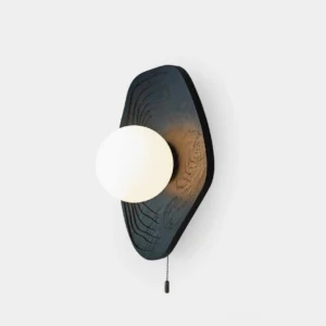 Baker modern wood orb wall sconce with frosted glass sphere and pull-chain switch on white studio background